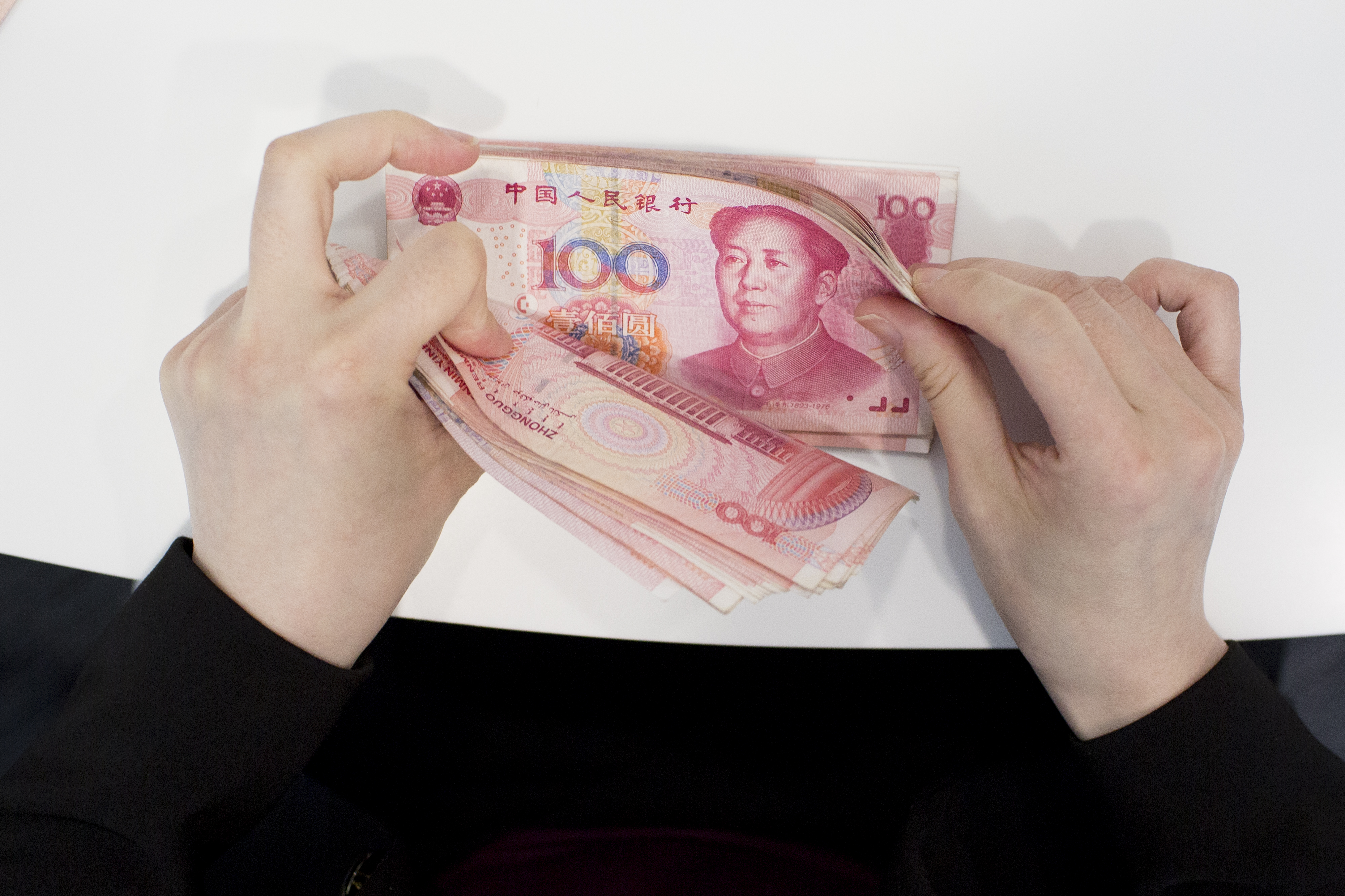 A total of US$420 billion worth of investment trusts is due for redemption on the mainland this year, according to some estimates. Photo: Bloomberg A total of US$420 billion worth of investment trusts is due for redemption on the mainland this year, according to some estimates. Photo: Bloomberg