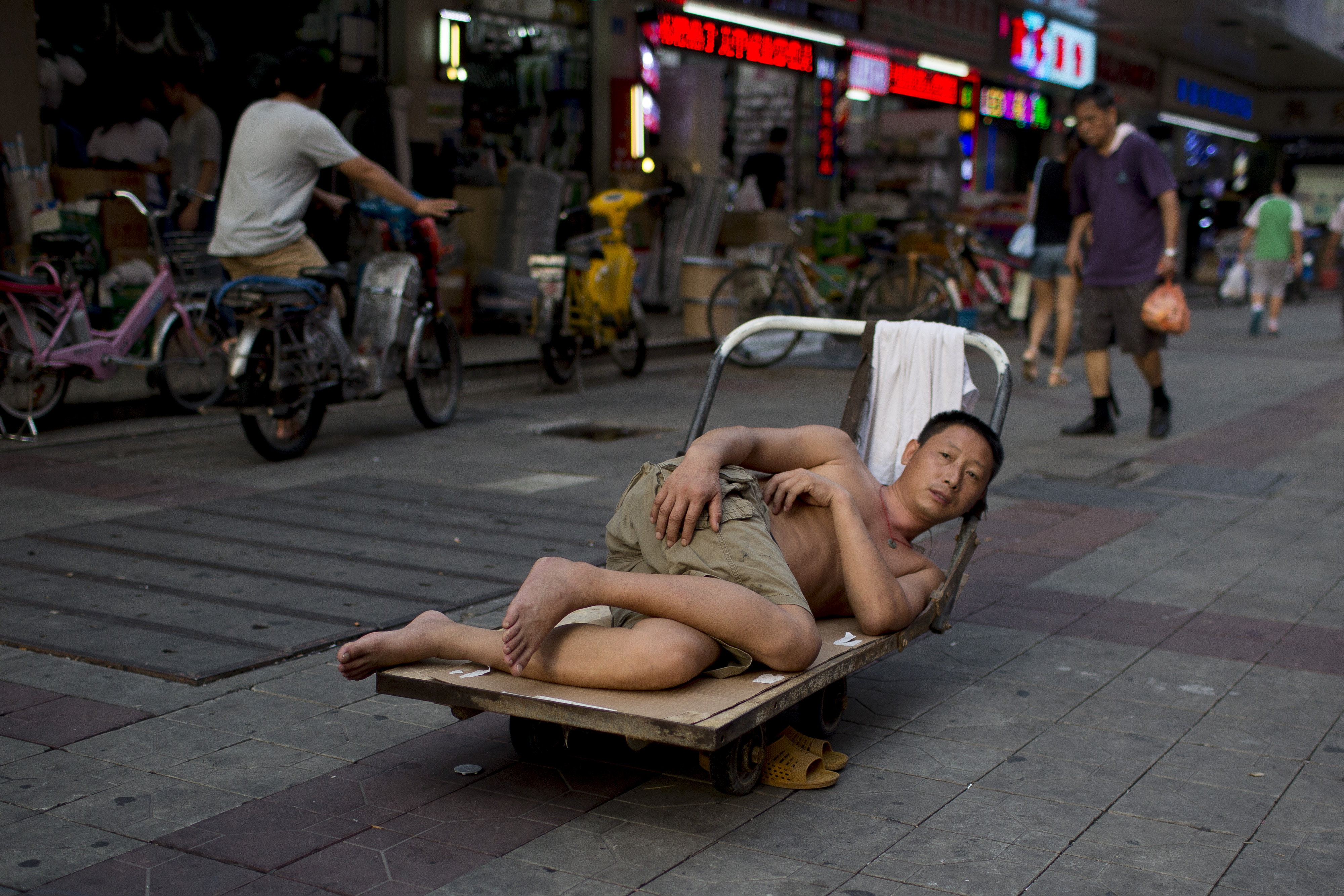 A laborer rests on his cart in Shenzhen. China needs more than an abundant capital stock or a highly capable workforce to become a truly developed economy. Photo: Bloomberg A laborer rests on his cart in Shenzhen. China needs more than an abundant capital stock or a highly capable workforce to become a truly developed economy. Photo: Bloomberg