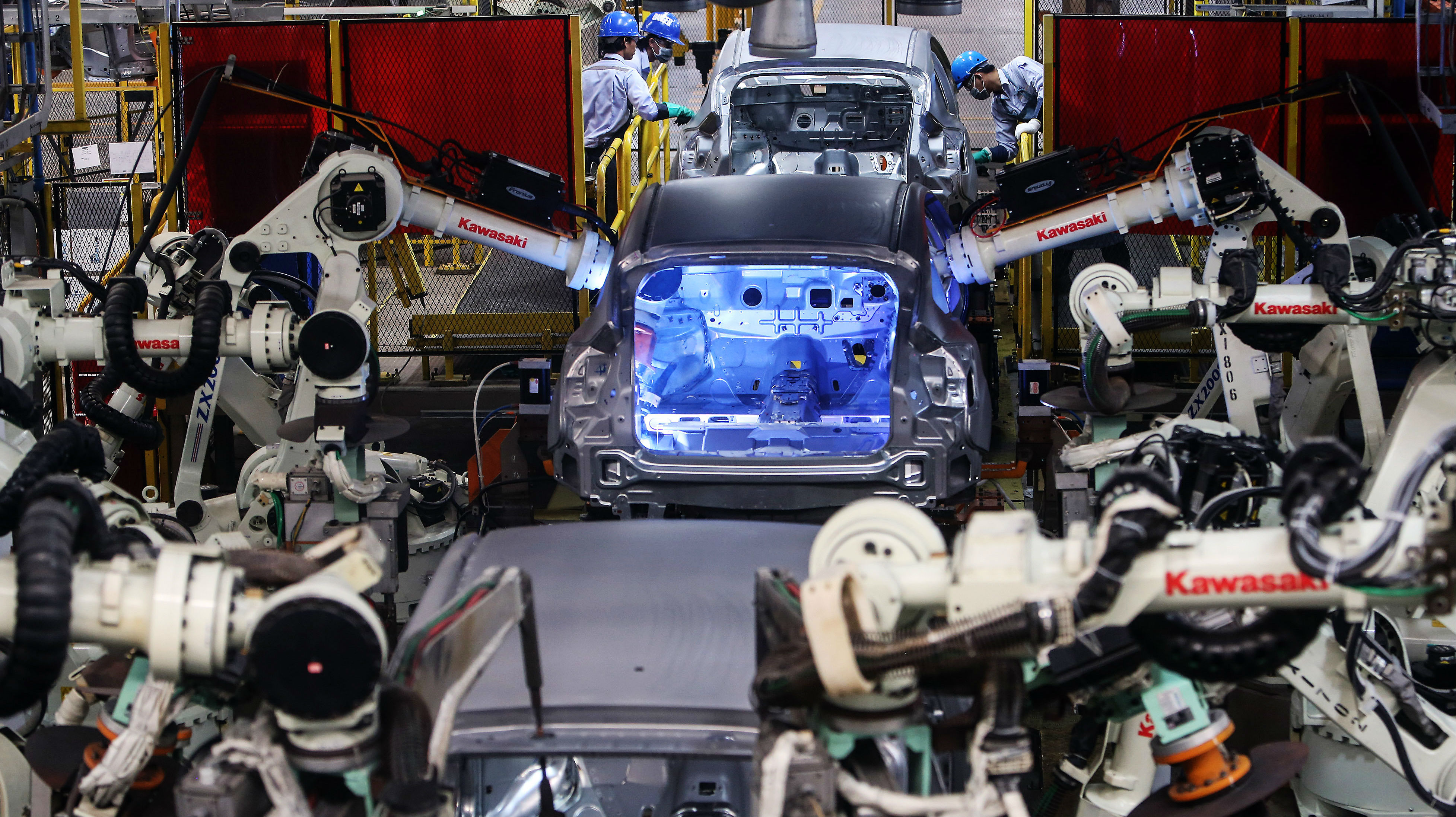 Welding robots work on cars at a Ford factory in Rayong, Thailand. What really matters is whether the jobs outside of the robot-computer economy remain valuable and in high demand. Photo: Bloomberg Welding robots work on cars at a Ford factory in Rayong, Thailand. What really matters is whether the jobs outside of the robot-computer economy remain valuable and in high demand. Photo: Bloomberg