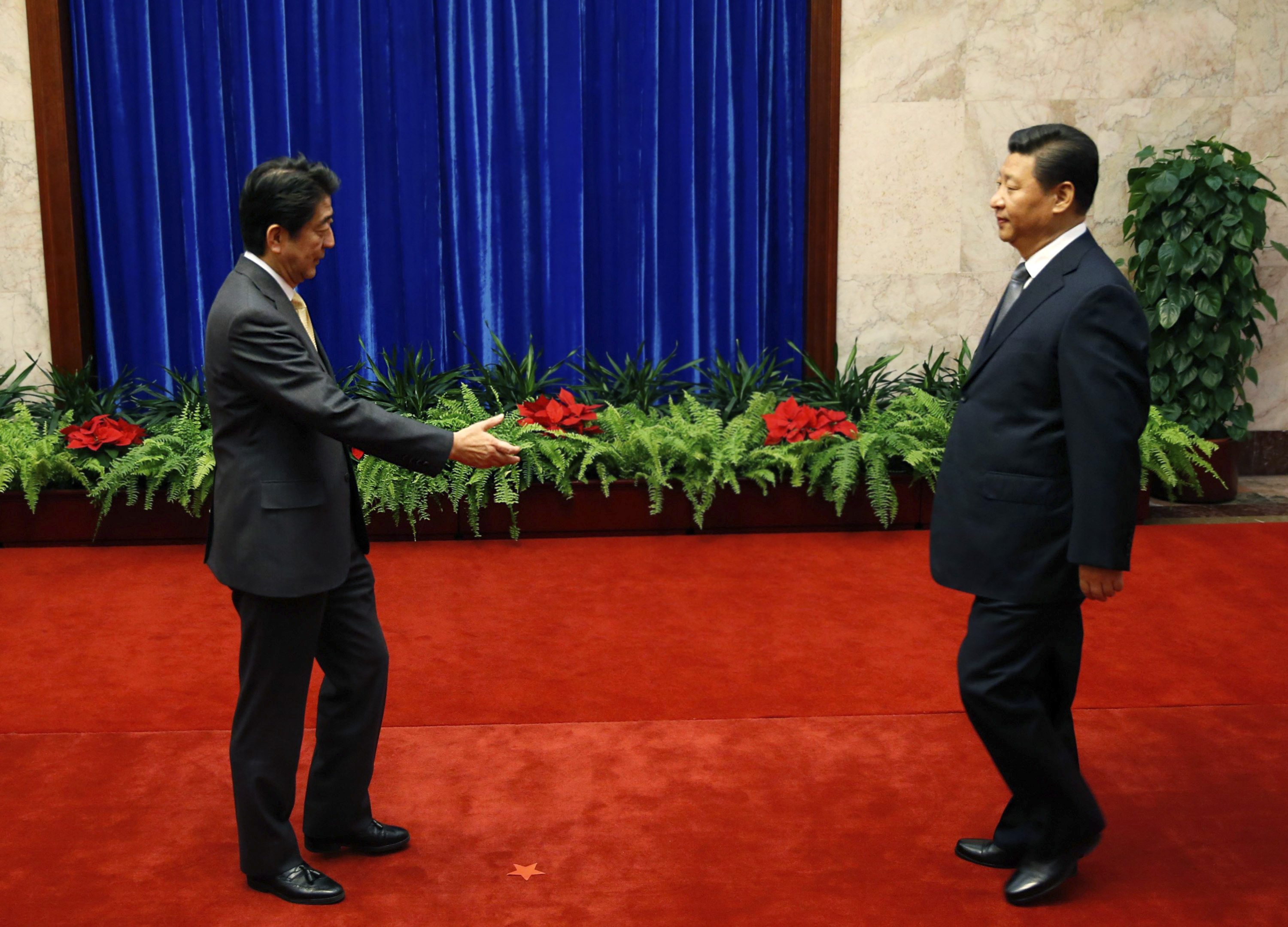 Shinzo Abe has to reach out to Xi Jinping and other leaders if Japan is to make friends among its neighbors. Photo: Reuters Shinzo Abe has to reach out to Xi Jinping and other leaders if Japan is to make friends among its neighbors. Photo: Reuters