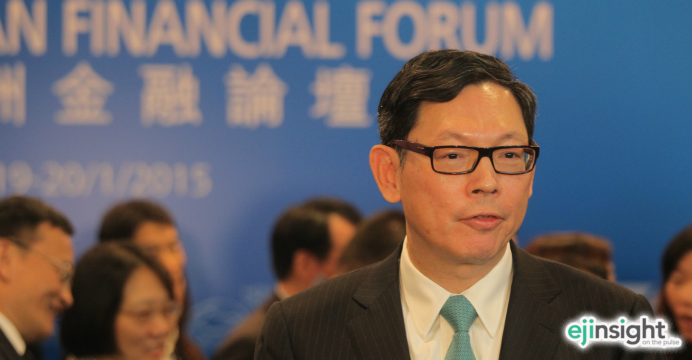 Monetary Authority chief executive Norman Chan said the prospects of renminbi business in the city look promising. Photo: HKEJ Monetary Authority chief executive Norman Chan said the prospects of renminbi business in the city look promising. Photo: HKEJ