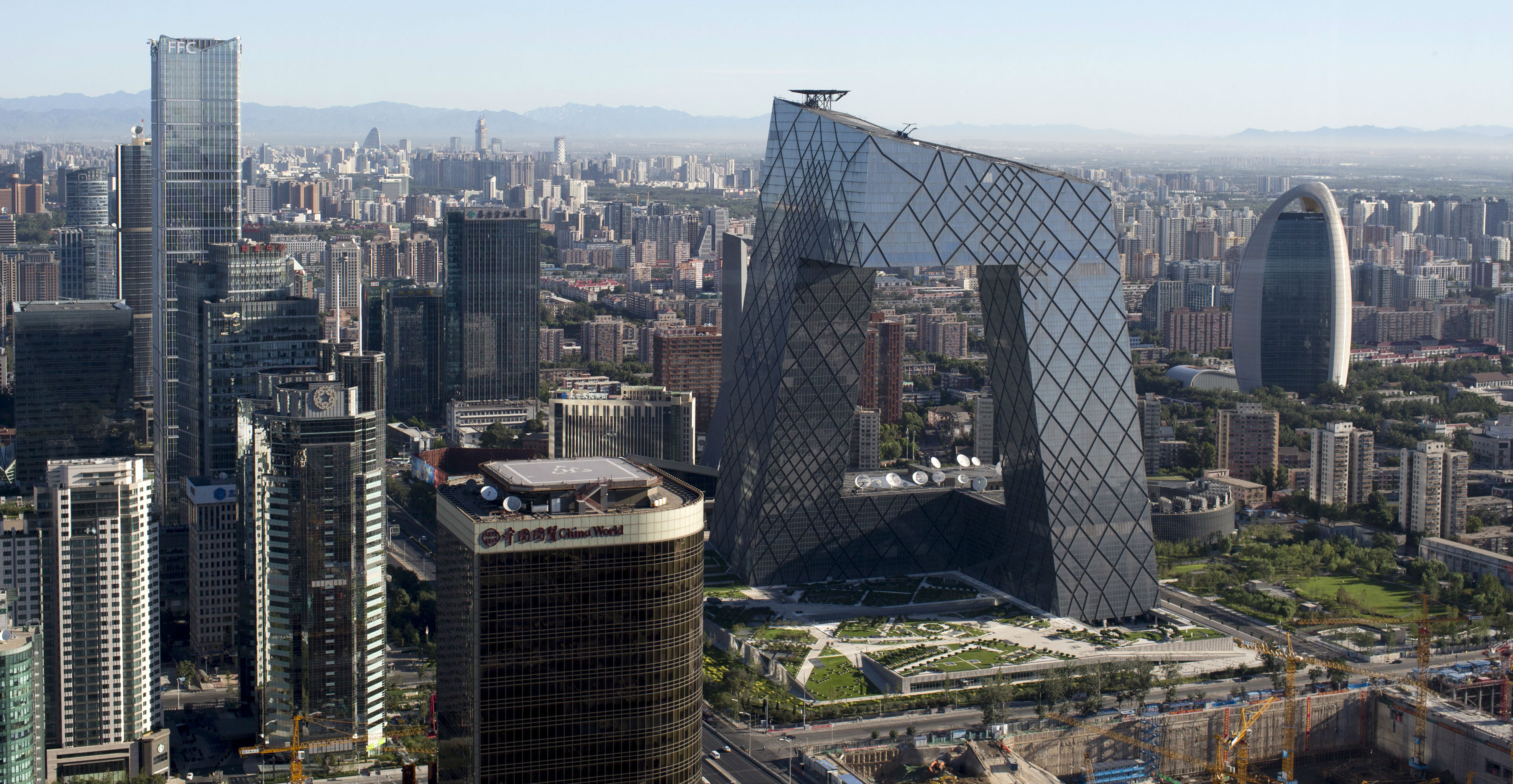 Beijing's central business district. Two Harvard scholars believe China's annual GDP growth rate will inevitably regress to less than 4 percent in the future. Photo: Bloomberg Beijing's central business district. Two Harvard scholars believe China's annual GDP growth rate will inevitably regress to less than 4 percent in the future. Photo: Bloomberg