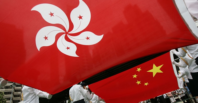 Hong Kong and Chinese flags are displayed at a ceremony. Leung Chun-ying told a Basic Law seminar that "one country, two systems" is a rare, exceptional arrangement. Photo: Internet Hong Kong and Chinese flags are displayed at a ceremony. Leung Chun-ying told a Basic Law seminar that "one country, two systems" is a rare, exceptional arrangement. Photo: Internet