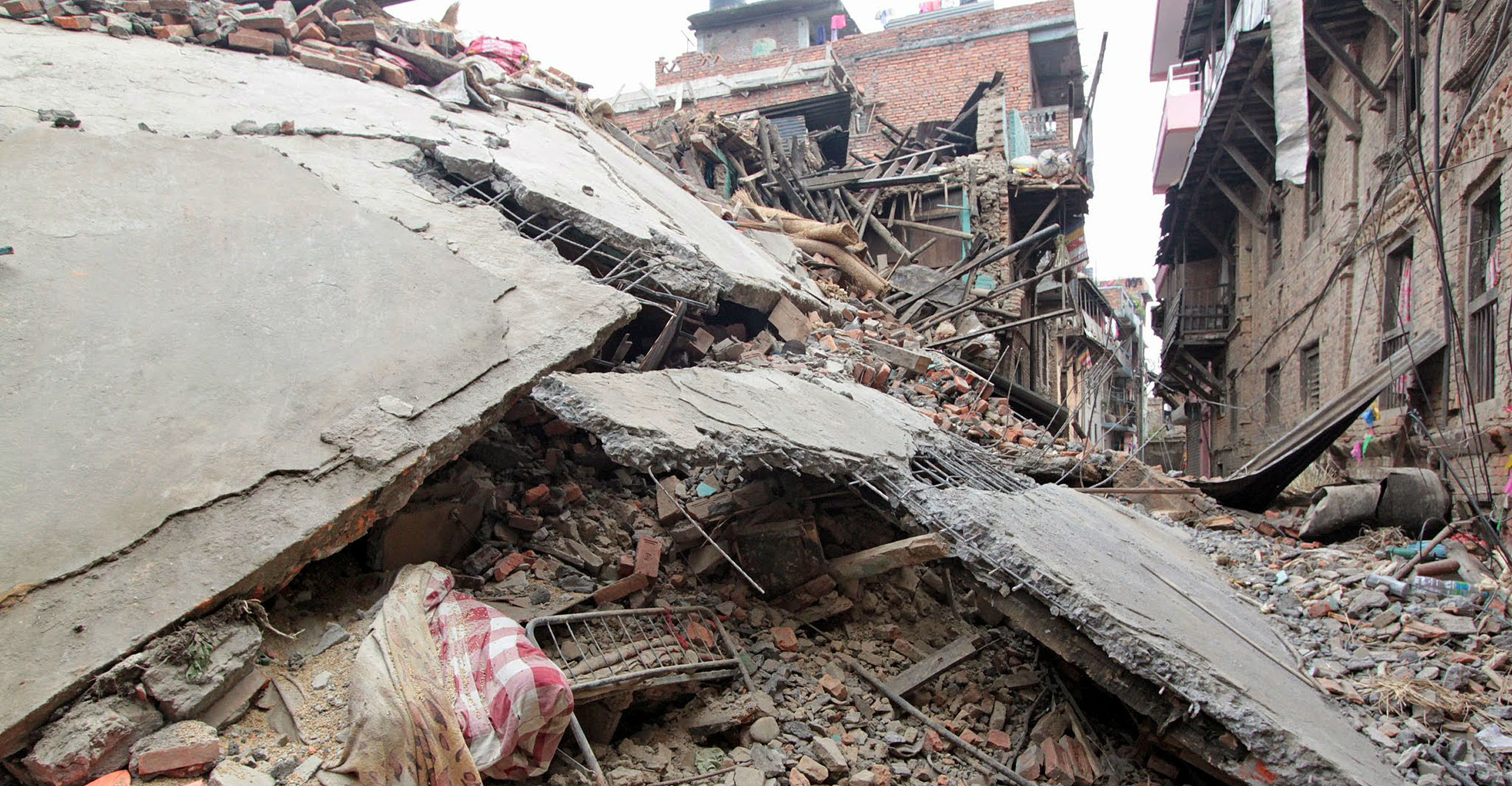 Buildings lie in ruins in Khokana in the Kathmandu Valley in this picture provided by aid agency CARE Australia a day after a powerful earthquake hit Nepal on Saturday. Photo: AFP Buildings lie in ruins in Khokana in the Kathmandu Valley in this picture provided by aid agency CARE Australia a day after a powerful earthquake hit Nepal on Saturday. Photo: AFP