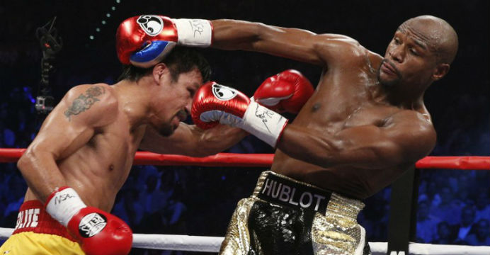 Manny Pacquiao (left) had difficulty breaking through Floyd Mayweather's defense. Photo: AFP Manny Pacquiao (left) had difficulty breaking through Floyd Mayweather's defense. Photo: AFP