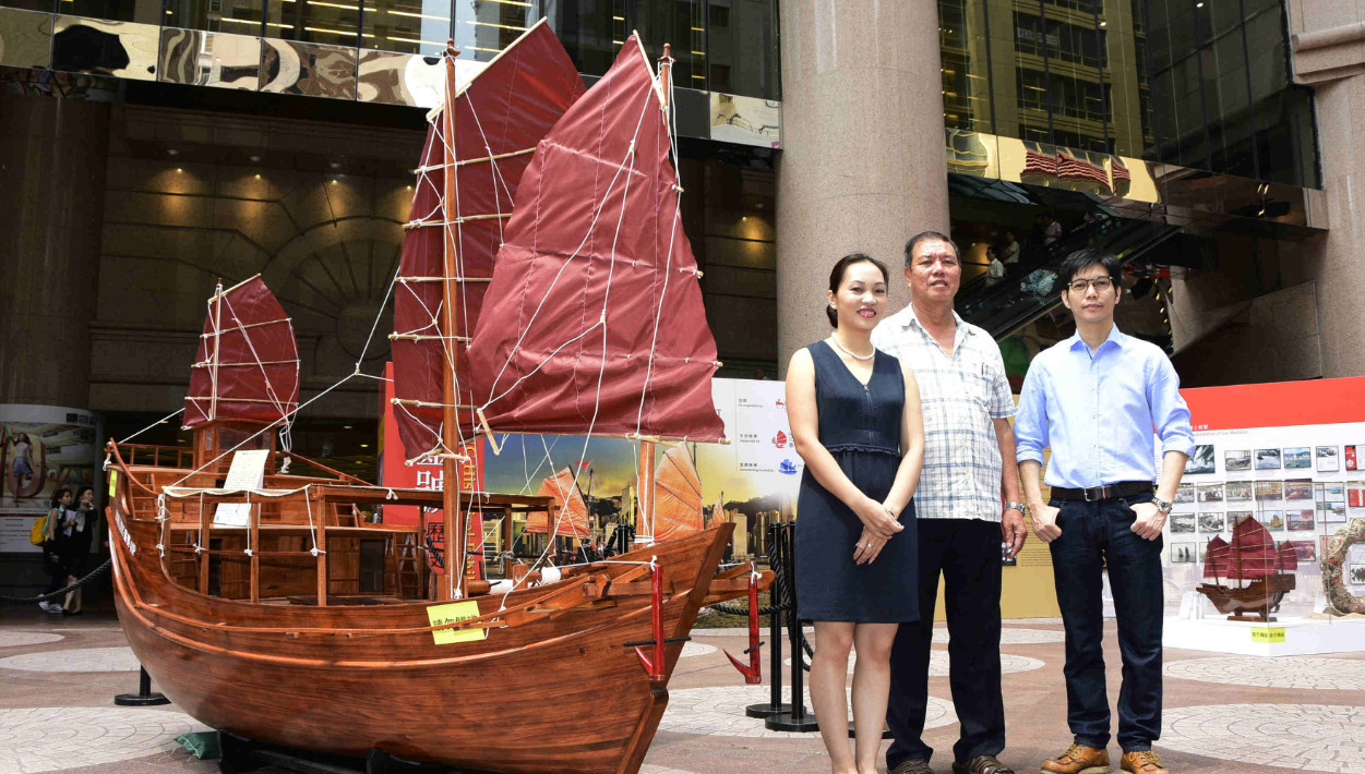 Cheng Ching-wah (left) and Yu Lik-hang (right), seen with a model of the Dukling, expect the junk to be able to sail back to Hong Kong by next month. Photo: HKEJ Cheng Ching-wah (left) and Yu Lik-hang (right), seen with a model of the Dukling, expect the junk to be able to sail back to Hong Kong by next month. Photo: HKEJ