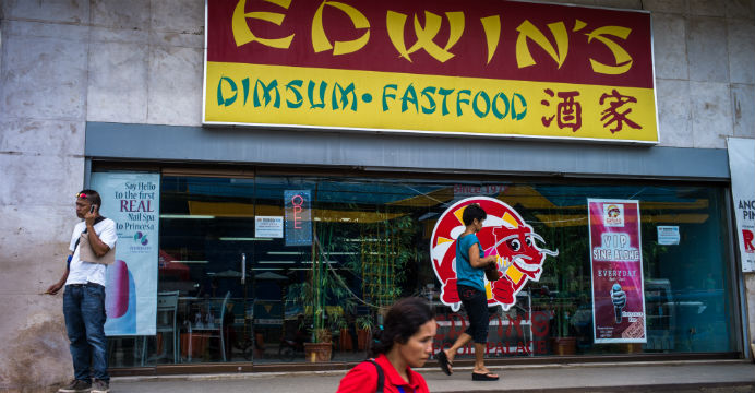 Edwin Tan, the owner of the Edwin's restaurant, is one of the ethnic Chinese who dominate the economy of Palawan Island in the Philippines. Photo: Bloomberg Edwin Tan, the owner of the Edwin's restaurant, is one of the ethnic Chinese who dominate the economy of Palawan Island in the Philippines. Photo: Bloomberg