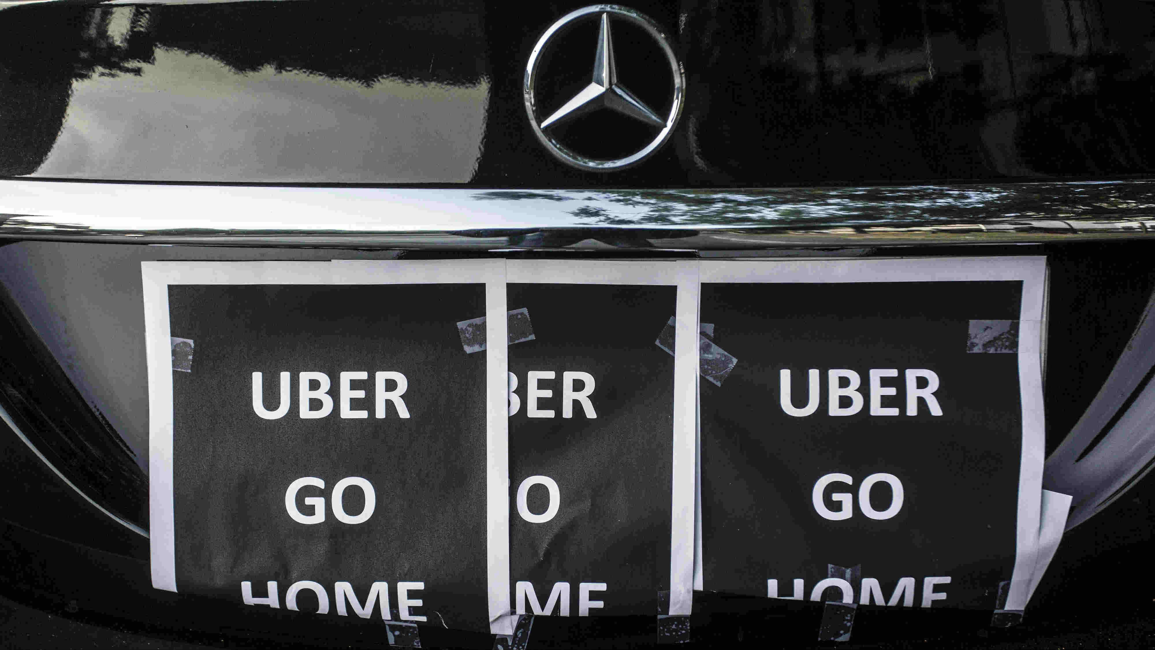 Uber has suspended its low-cost UberPop service in France in a bid to soothe an ongoing conflict with taxi drivers in the country. Photo: Bloomberg Uber has suspended its low-cost UberPop service in France in a bid to soothe an ongoing conflict with taxi drivers in the country. Photo: Bloomberg