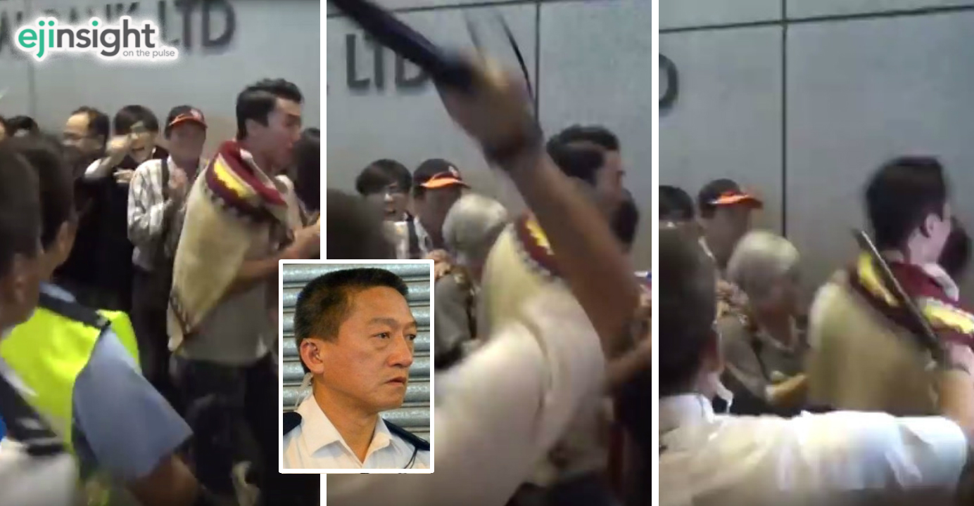 Franklin Chu is seen brandishing his police baton at pedestrians on a sidewalk in Mong Kok in November. Photo: NowTV, inmedia.hk Franklin Chu is seen brandishing his police baton at pedestrians on a sidewalk in Mong Kok in November. Photo: NowTV, inmedia.hk