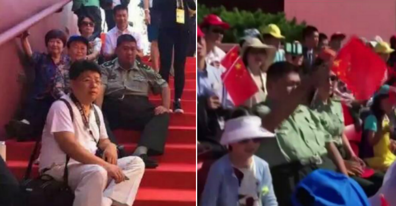 Major General Mao Xinyu and his family sat on a staircase before the parade. He later appeared lost in thoughts, waving the national flag upside-down. Photos: weibo.com, tvmost.com.hk Major General Mao Xinyu and his family sat on a staircase before the parade. He later appeared lost in thoughts, waving the national flag upside-down. Photos: weibo.com, tvmost.com.hk