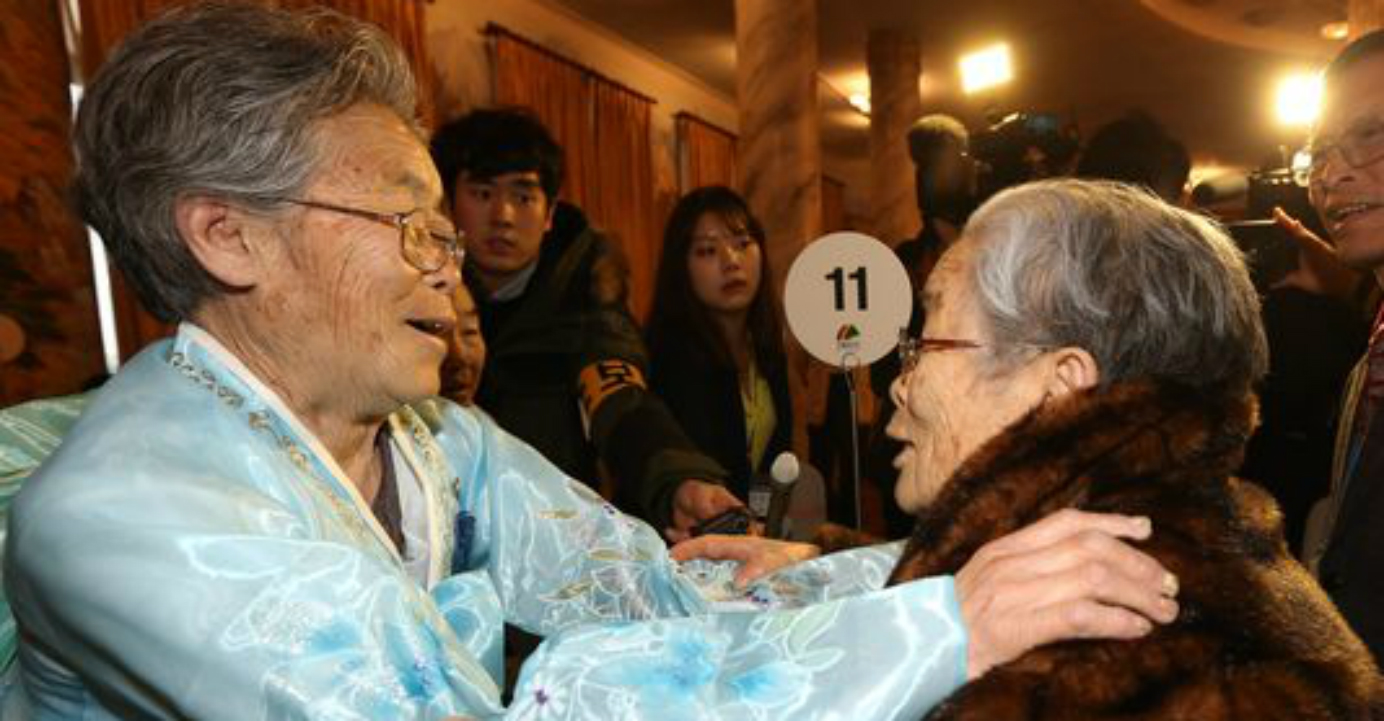 Kim Song-Yun (right) of South Korea embraces her sister Kim Seok-Ryo (L) of North Korea during a reunion of families divided by war at the Mount Kumgang resort on Feb. 20, 2014. Photo: AFP/Yonhap Kim Song-Yun (right) of South Korea embraces her sister Kim Seok-Ryo (L) of North Korea during a reunion of families divided by war at the Mount Kumgang resort on Feb. 20, 2014. Photo: AFP/Yonhap
