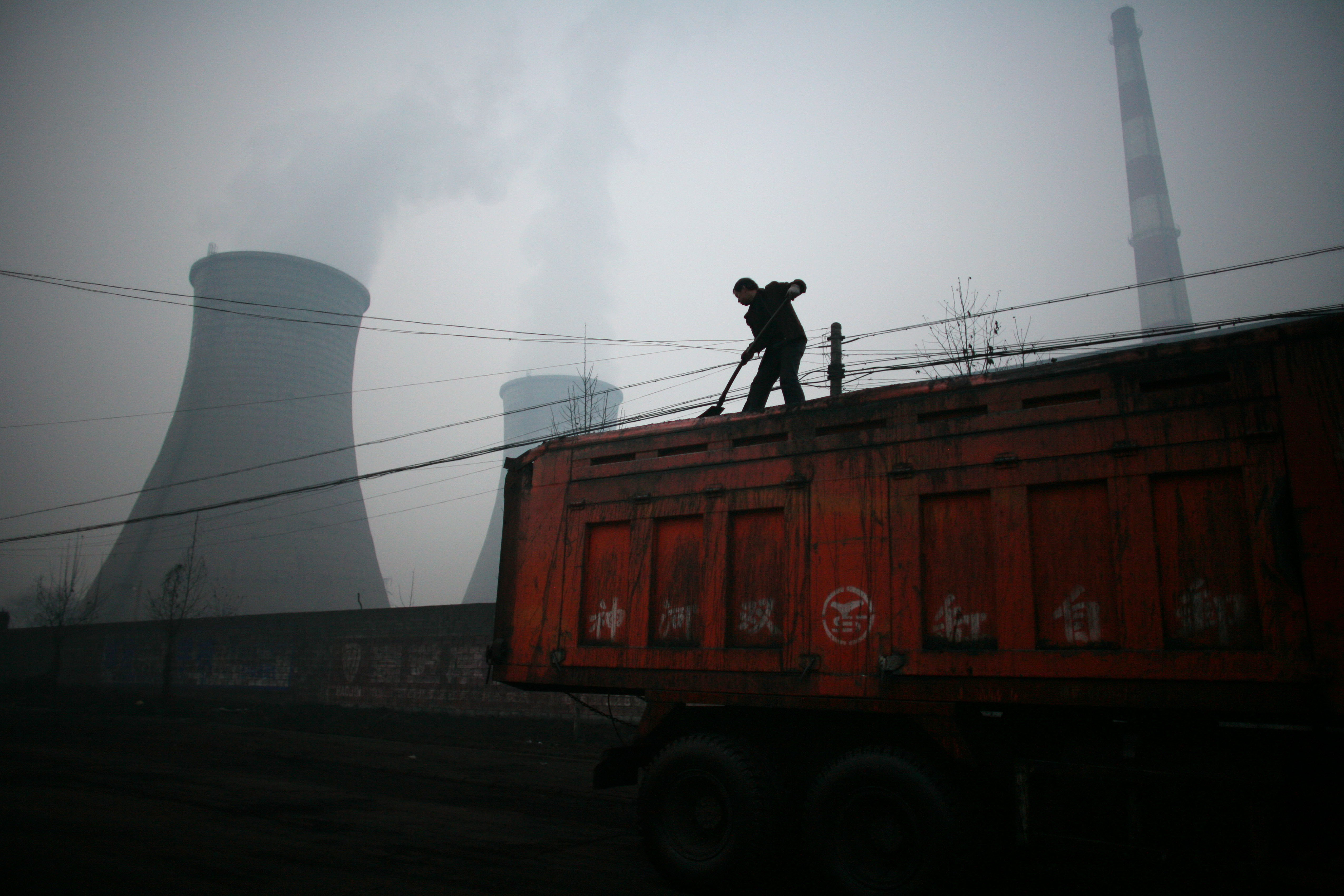 China is pilot testing emissions-trading markets and expects to expand the program next year. Photo: Bloomberg China is pilot testing emissions-trading markets and expects to expand the program next year. Photo: Bloomberg