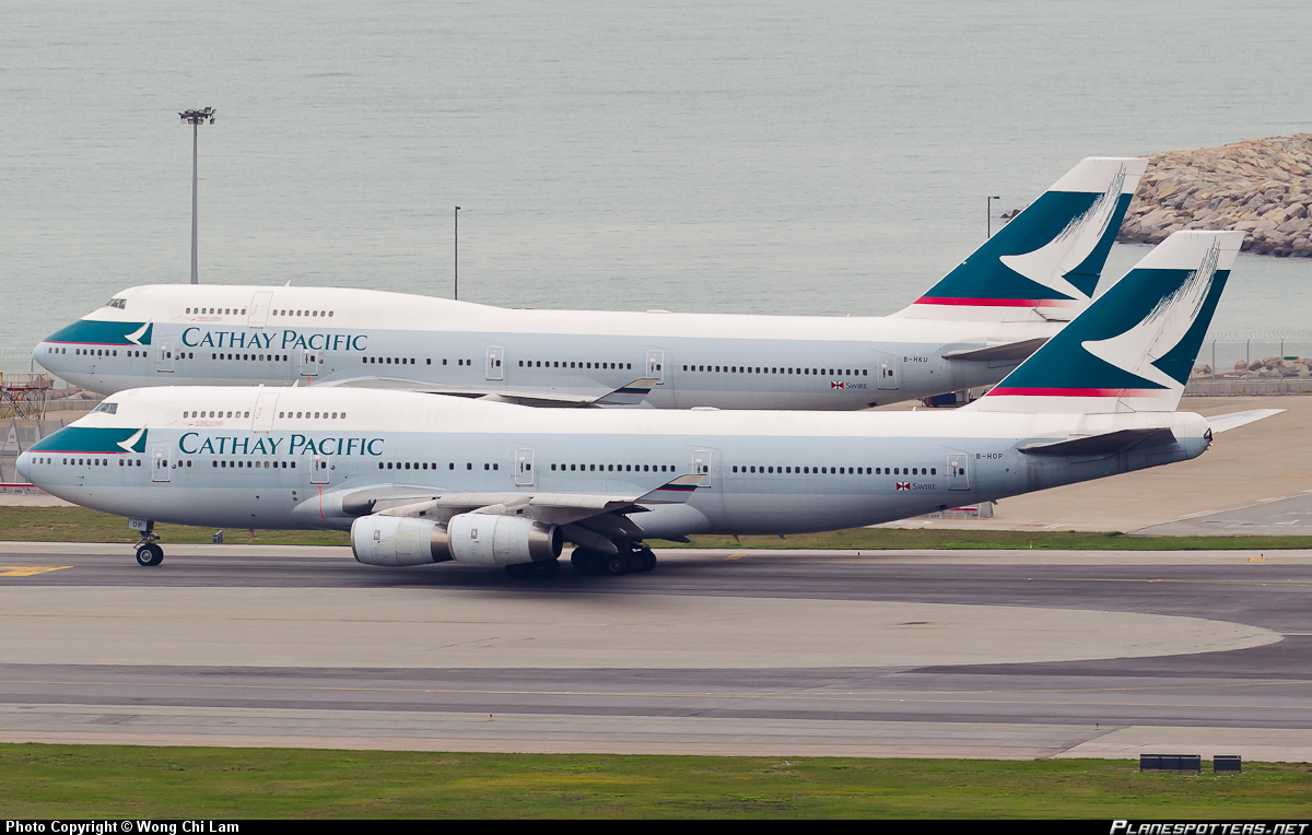 Two Cathay Boeing 747-400s sit on the tarmac of the Hong Kong International Airport. Cathay has speeded up the retirement of the superjumbo. Photo: Wong Chi-lam Two Cathay Boeing 747-400s sit on the tarmac of the Hong Kong International Airport. Cathay has speeded up the retirement of the superjumbo. Photo: Wong Chi-lam