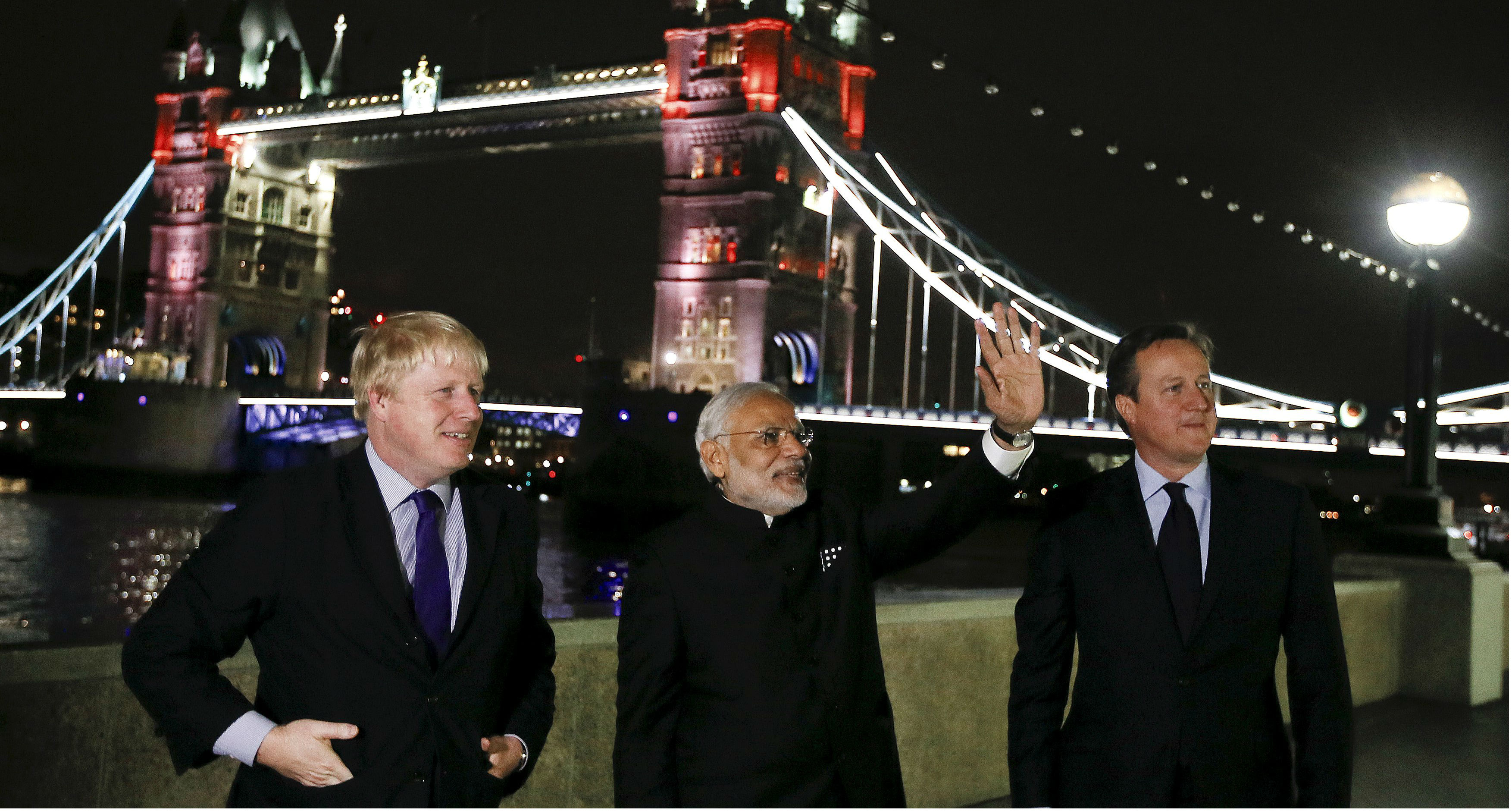 Indian leader Narendra Modi is flanked by British Prime Minister David Cameron (right) and London Mayor Boris Johnson in front of Tower Bridge in London on Thursday. Photo: Reuters Indian leader Narendra Modi is flanked by British Prime Minister David Cameron (right) and London Mayor Boris Johnson in front of Tower Bridge in London on Thursday. Photo: Reuters