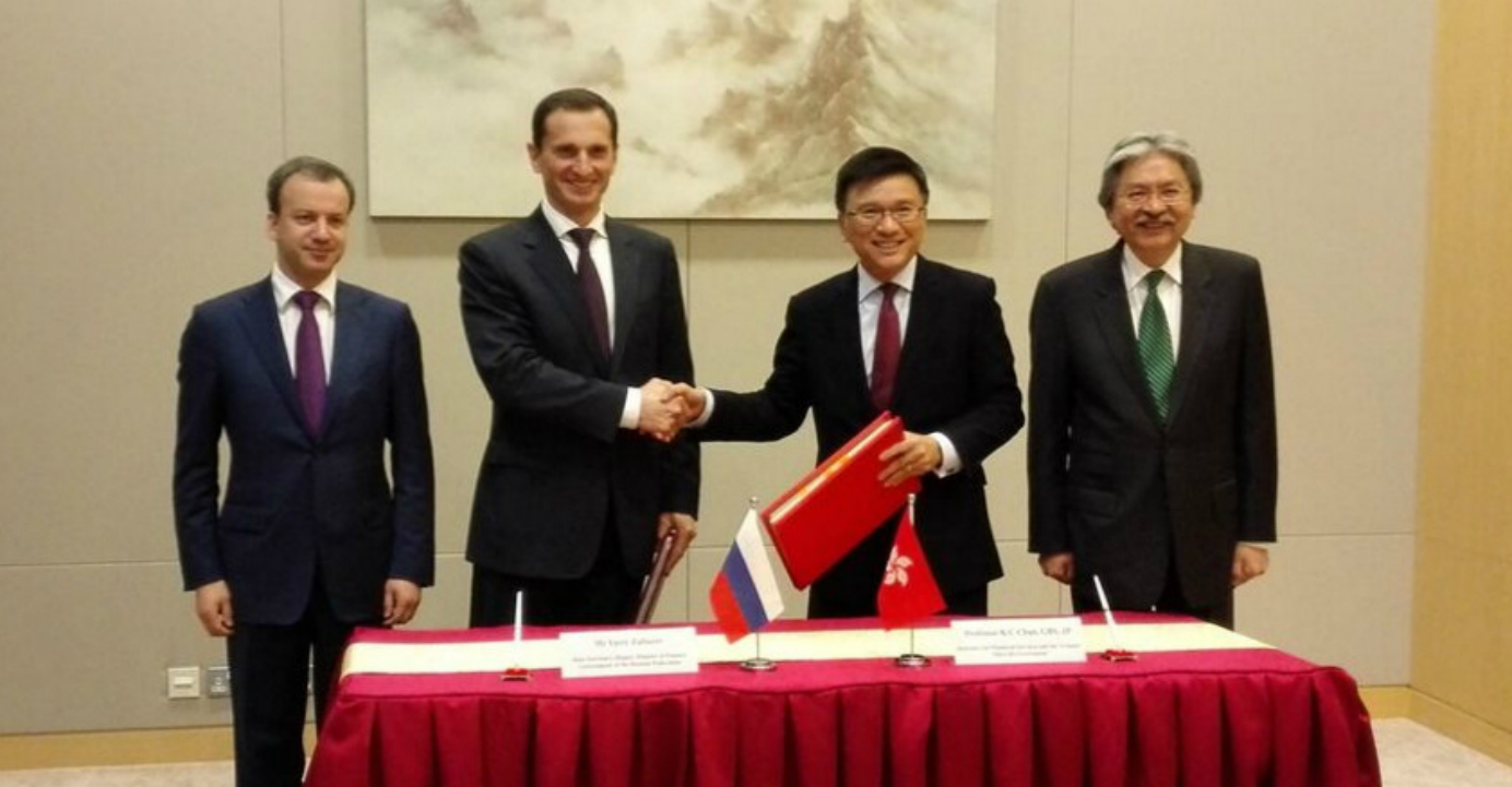 K C Chan (second from right), Hong Kong's Secretary for Financial Services and the Treasury, and Yuriy Zubarev (second from left), Russia’s Deputy Minister of Finance, signed a pact on Jan 18 to avoid double taxation. John Tsang (right) and Arkady Dv K C Chan (second from right), Hong Kong's Secretary for Financial Services and the Treasury, and Yuriy Zubarev (second from left), Russia’s Deputy Minister of Finance, signed a pact on Jan 18 to avoid double taxation. John Tsang (right) and Arkady Dv