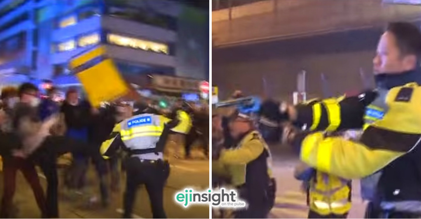 A baton-wielding policeman (left) lunges into a group of protesters intending to force them to stand back. After he fell to the ground, another police officer fired two warning shots into the air. Photos: TVB A baton-wielding policeman (left) lunges into a group of protesters intending to force them to stand back. After he fell to the ground, another police officer fired two warning shots into the air. Photos: TVB