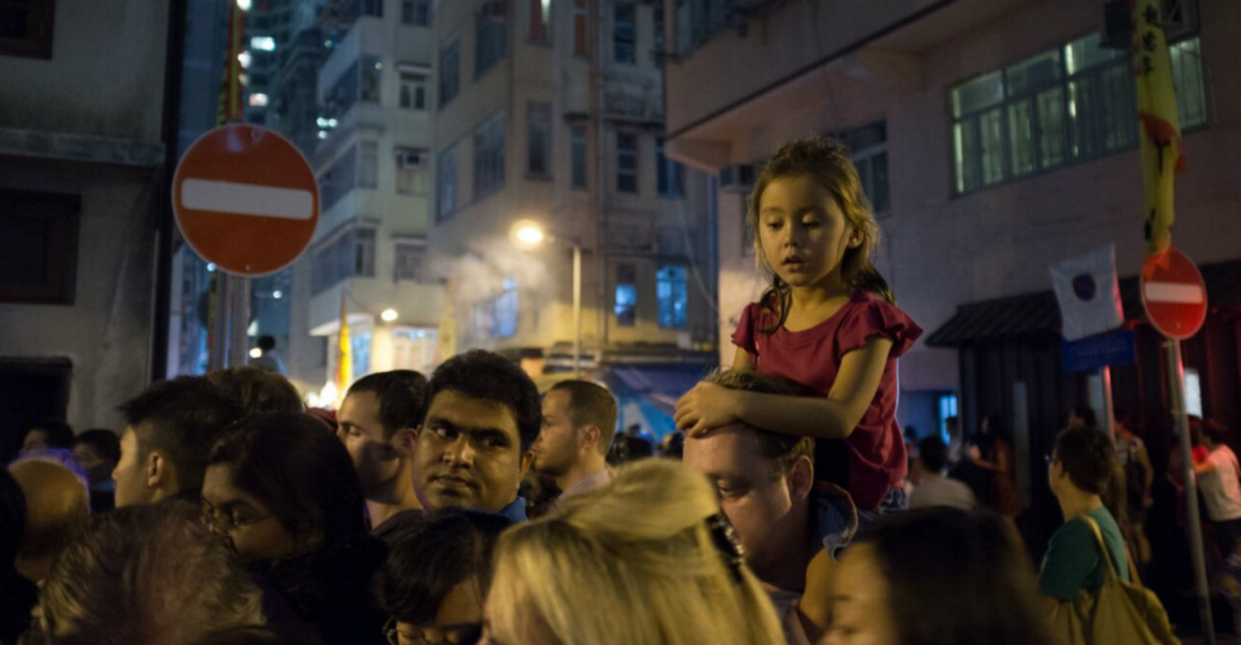 The streets of Tai Hang are packed with elbow-to-elbow crowds. Photo: Brendon Hong The streets of Tai Hang are packed with elbow-to-elbow crowds. Photo: Brendon Hong