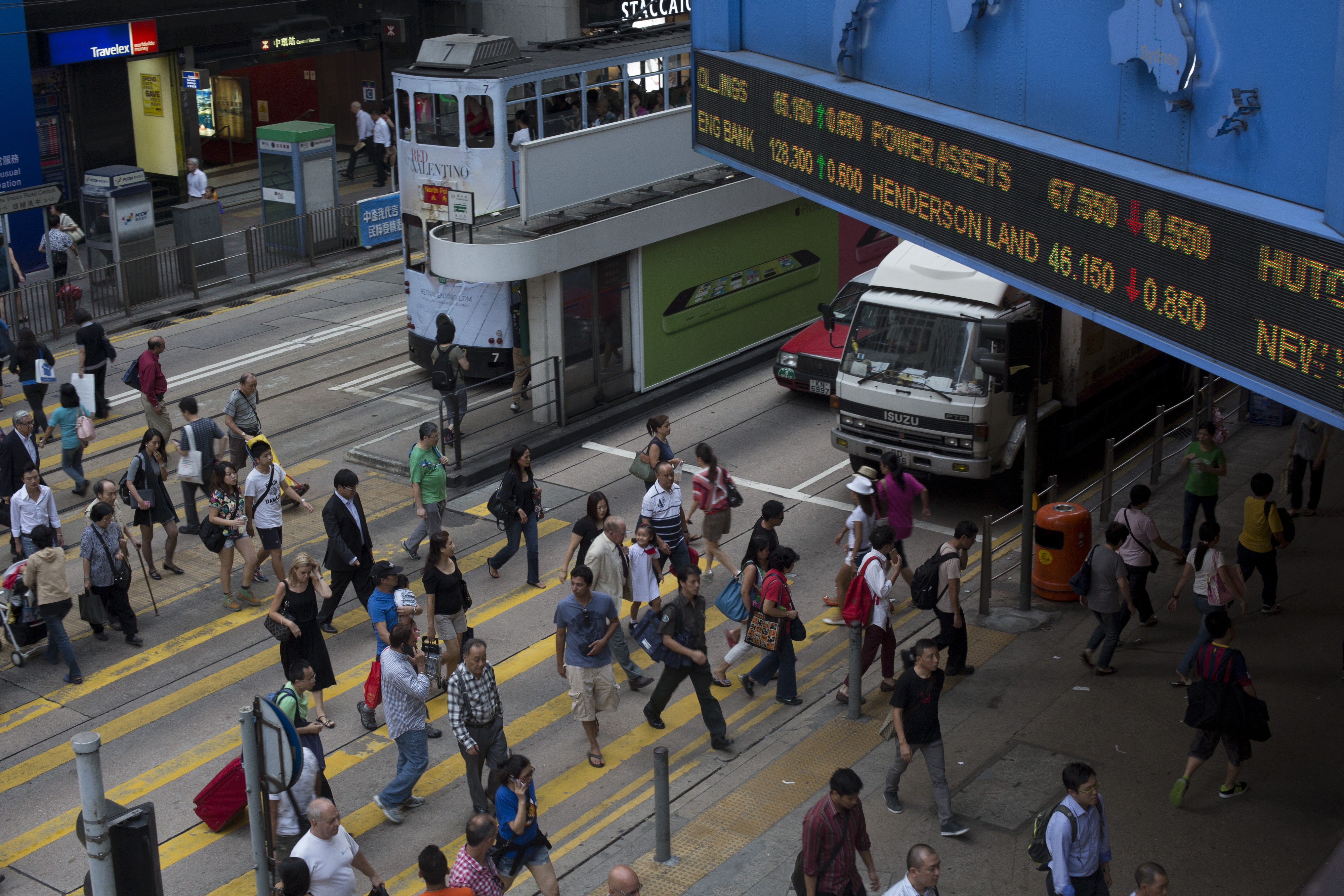 Hong Kong must curb parochialism and uphold the city's international character if it is to remain a global financial hotspot, observers say. Photo: Bloomberg Hong Kong must curb parochialism and uphold the city's international character if it is to remain a global financial hotspot, observers say. Photo: Bloomberg