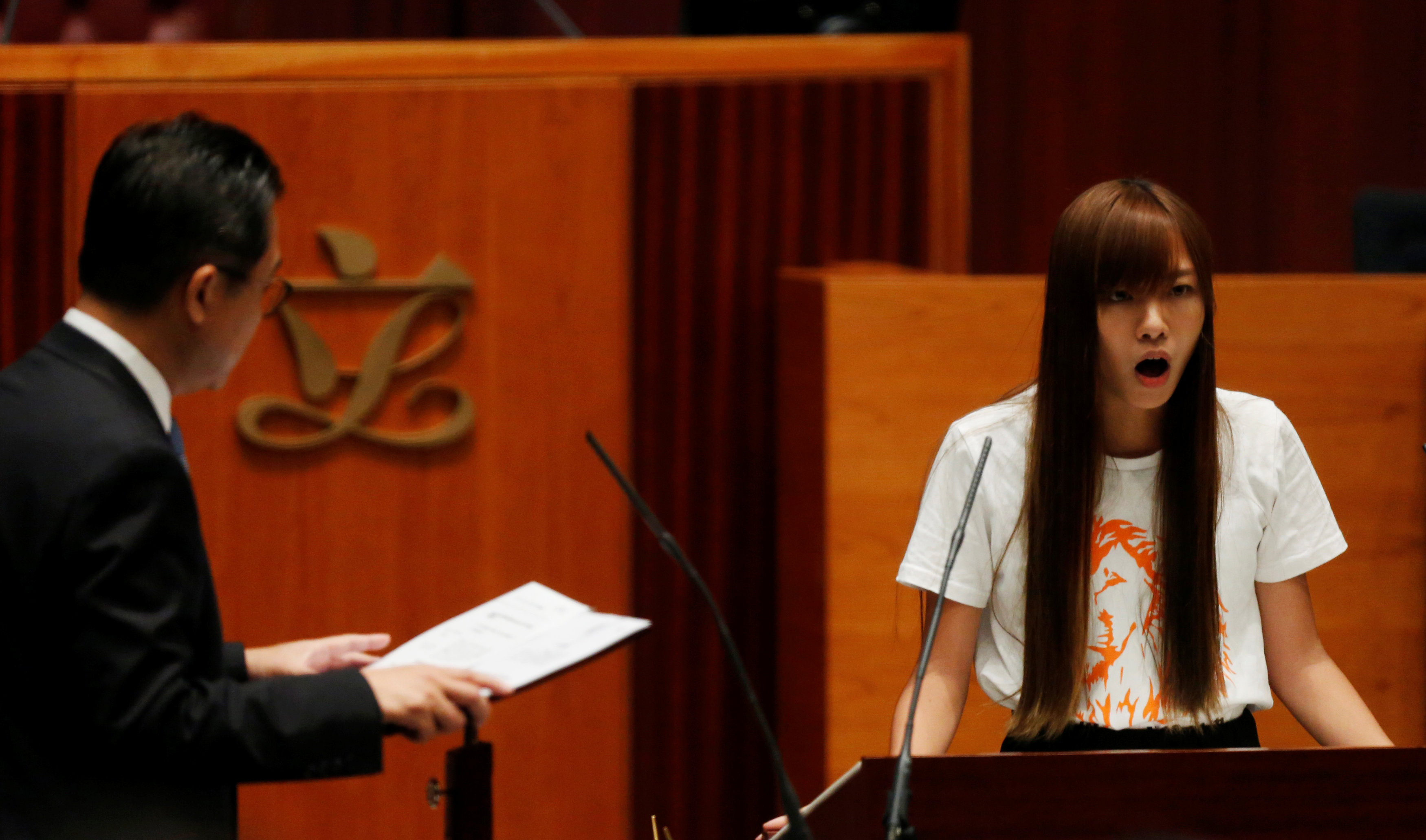 Yau Wai-ching's and her Youngspiration comrade-in-arms Sixtus Baggio Leung's oath-taking triggered an uproar from the pro-Beijing camp. Photo: Reuters Yau Wai-ching's and her Youngspiration comrade-in-arms Sixtus Baggio Leung's oath-taking triggered an uproar from the pro-Beijing camp. Photo: Reuters