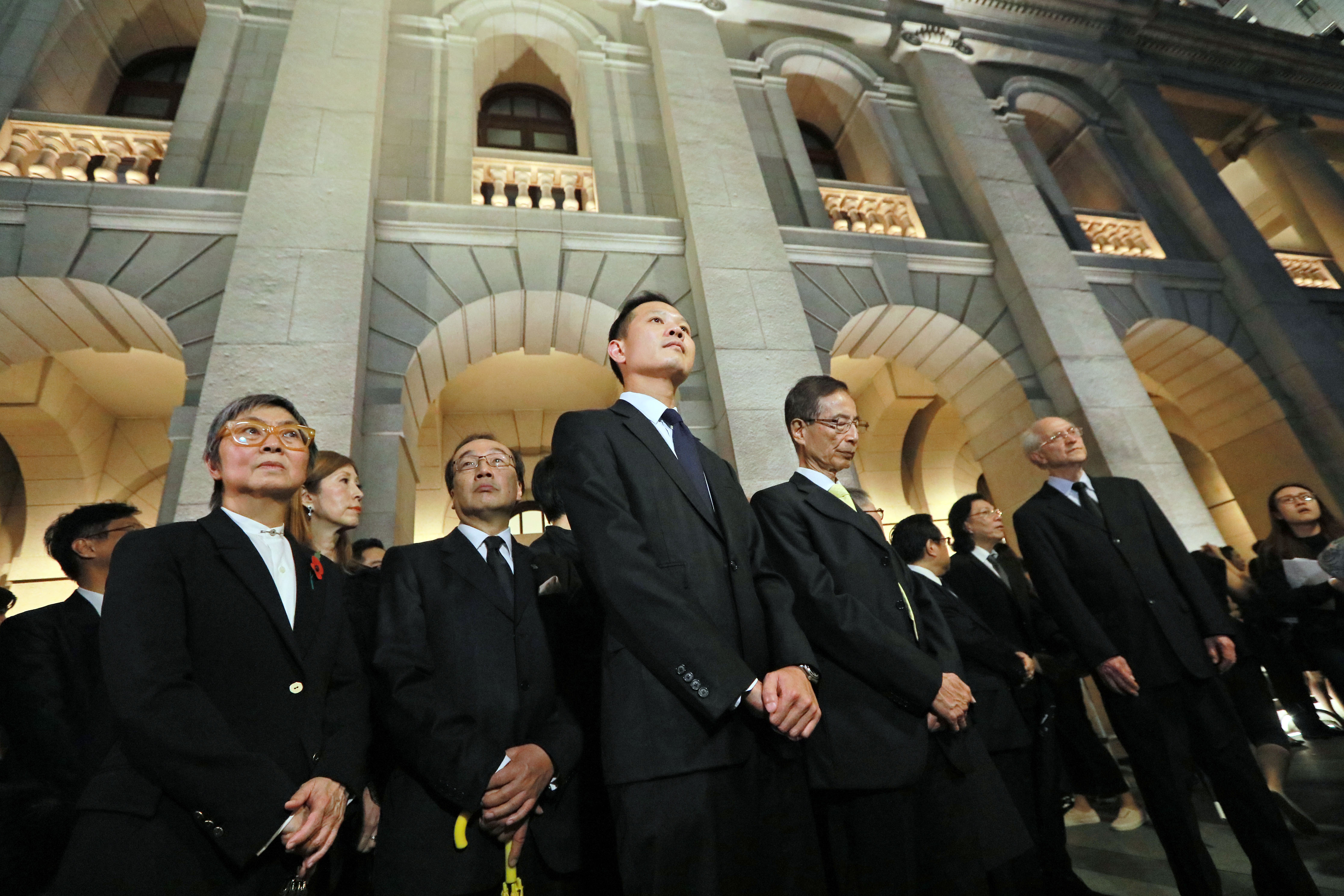 Lawyers in Hong Kong stage a silent protest against Beijing's perceived undermining of Hong Kong's legal independence. Photo: HKEJ Lawyers in Hong Kong stage a silent protest against Beijing's perceived undermining of Hong Kong's legal independence. Photo: HKEJ