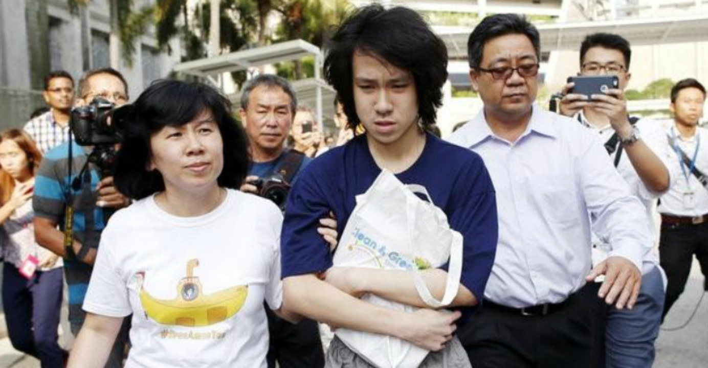 Amos Yee (center) cited the Singapore jail terms he received because of his anti-government remarks on YouTube as evidence that he was persecuted by his own government because of his political opinions. Photo: Reuters Amos Yee (center) cited the Singapore jail terms he received because of his anti-government remarks on YouTube as evidence that he was persecuted by his own government because of his political opinions. Photo: Reuters