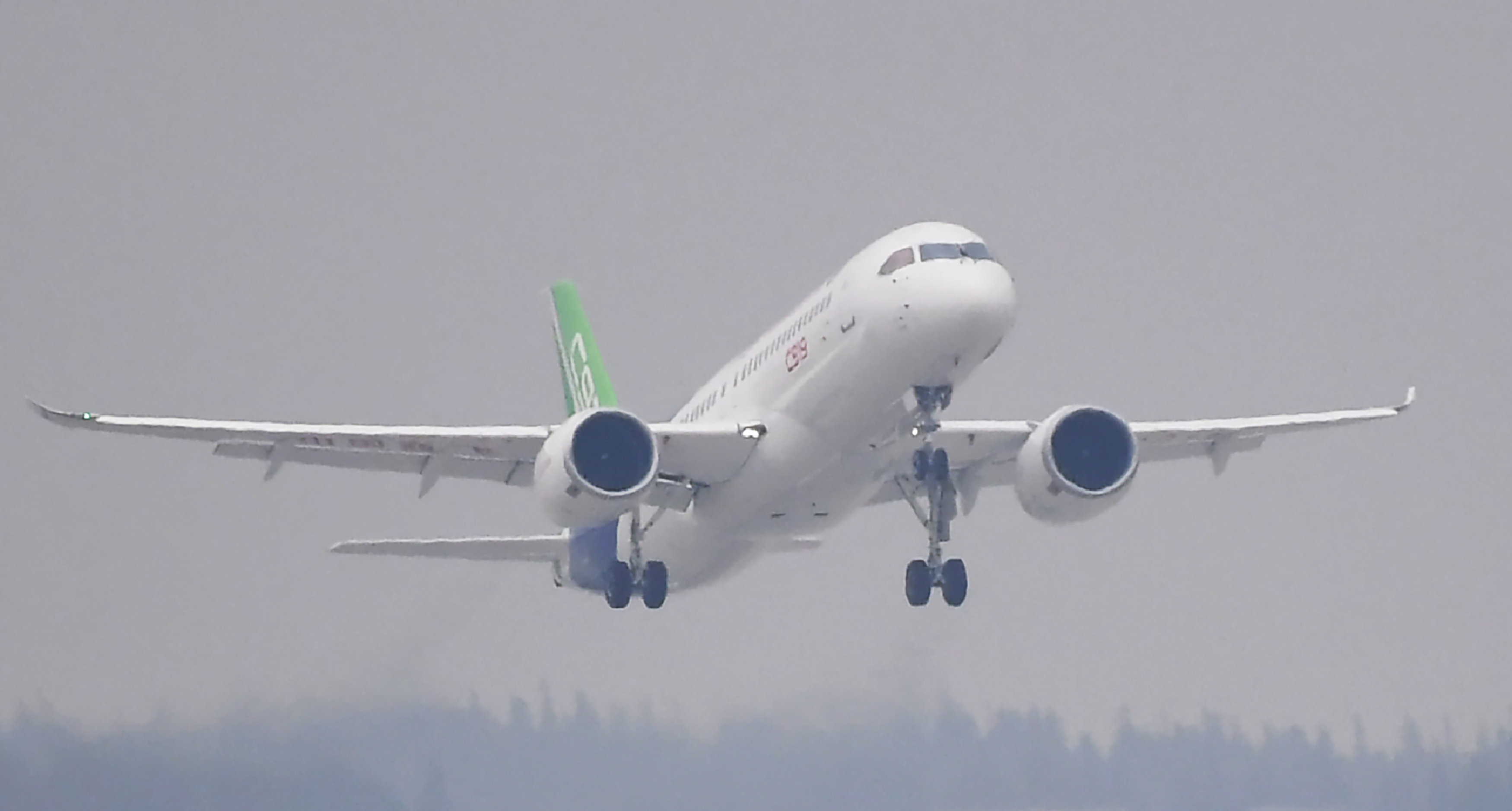 China's C919 passenger jet takes off from the Pudong International Airport in Shanghai on its maiden flight on Friday. Photo: Reuters China's C919 passenger jet takes off from the Pudong International Airport in Shanghai on its maiden flight on Friday. Photo: Reuters