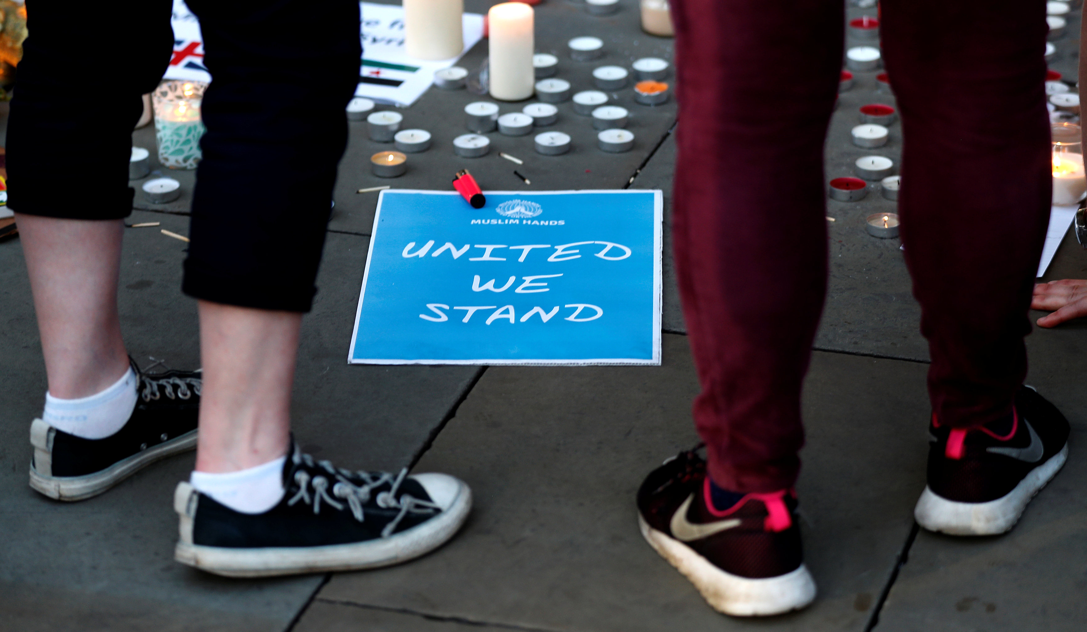 Well-wishers pay their respects to all those affected by the bomb attack, following a vigil in central Manchester. Photo: Reuters Well-wishers pay their respects to all those affected by the bomb attack, following a vigil in central Manchester. Photo: Reuters