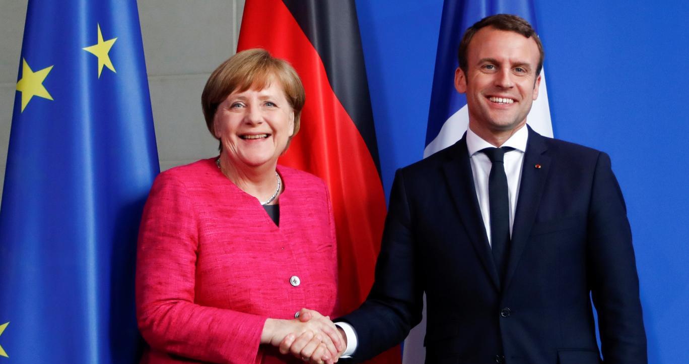 French President Emmanuel Macron (right) wants to meet German Chancellor Angela Merkel halfway on European integration but everything hinges on the success of French reforms. Photo: Reuters French President Emmanuel Macron (right) wants to meet German Chancellor Angela Merkel halfway on European integration but everything hinges on the success of French reforms. Photo: Reuters