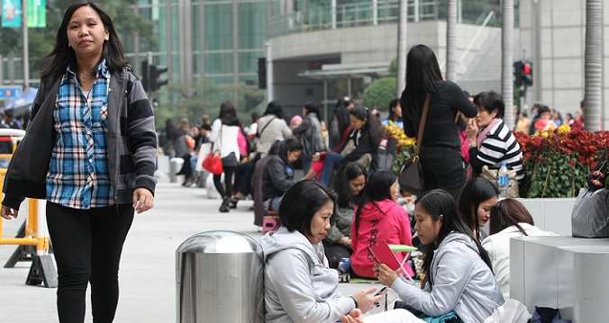 Domestic helpers working for families in Sheung Wan and other parts of the Central and Western District get the highest pay, according to a new survey. Photo: HKEJ Domestic helpers working for families in Sheung Wan and other parts of the Central and Western District get the highest pay, according to a new survey. Photo: HKEJ