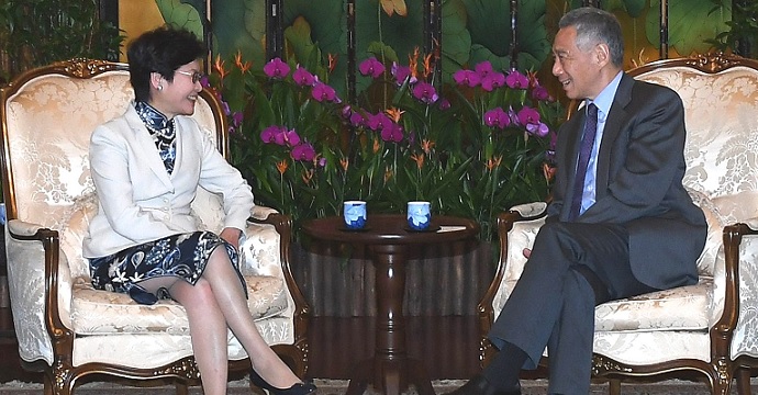 Lam met with Singapore's Prime Minister Lee Hsien Loong in August. She chose Singapore as the destination of her first overseas visit since taking office as Chief Executive. Photo: GovHK Lam met with Singapore's Prime Minister Lee Hsien Loong in August. She chose Singapore as the destination of her first overseas visit since taking office as Chief Executive. Photo: GovHK