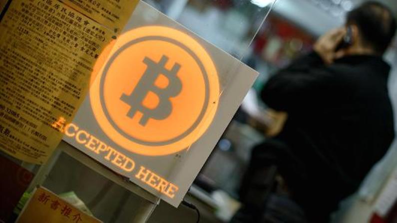 At over US$4,200 (as of Oct. 5), a single unit of Bitcoin is now worth more than three times an ounce of gold. Photo: AFP At over US$4,200 (as of Oct. 5), a single unit of Bitcoin is now worth more than three times an ounce of gold. Photo: AFP