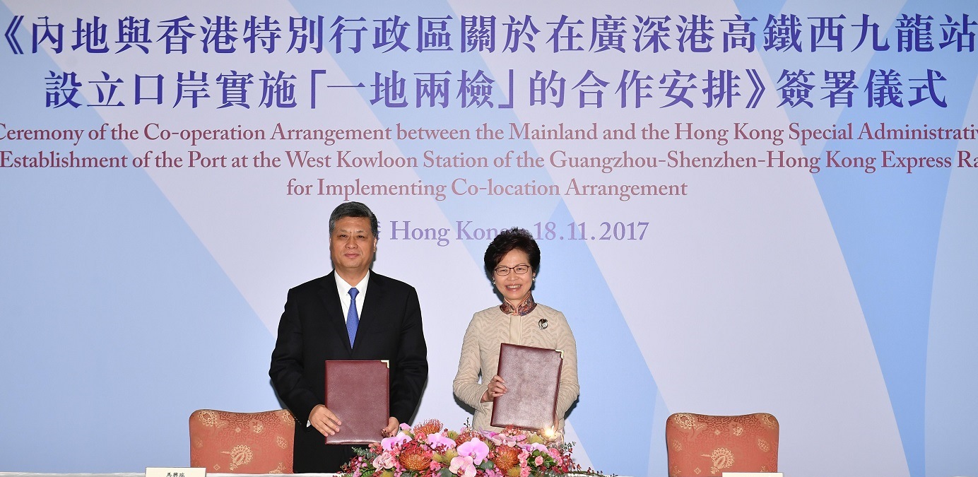 Chief Executive Carrie Lam (right) and Guangdong governor Ma Xingrui are shown after the signing of the co-operation arrangement on the co-location plan for the express rail link. Photo: Information Services Department Chief Executive Carrie Lam (right) and Guangdong governor Ma Xingrui are shown after the signing of the co-operation arrangement on the co-location plan for the express rail link. Photo: Information Services Department