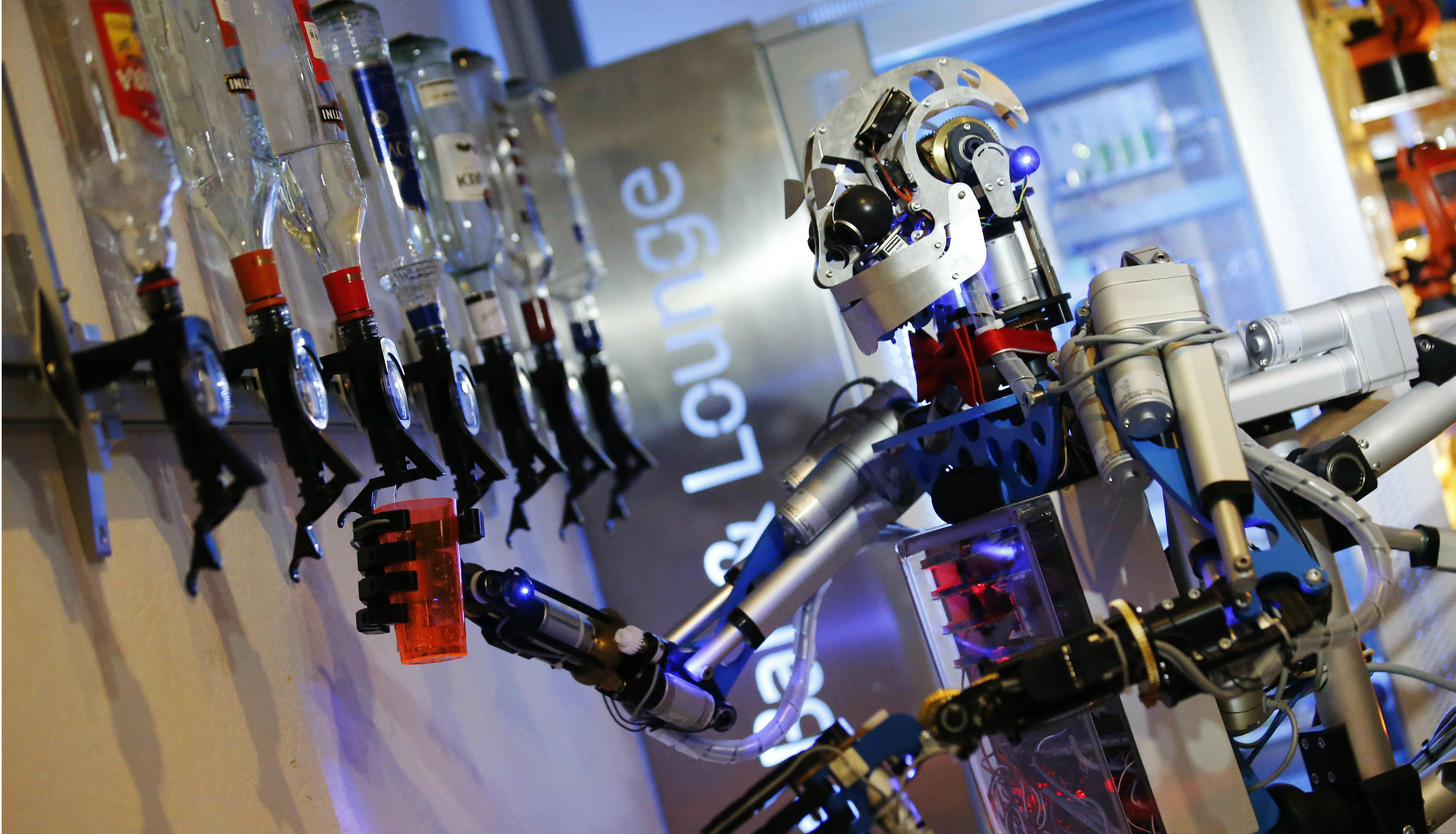A robotic bartender mixes cocktails for guests. New technologies promise higher productivity and greater efficiency, but they also stoke fears about their effects on jobs, skills, and wages. Photo: Reuters A robotic bartender mixes cocktails for guests. New technologies promise higher productivity and greater efficiency, but they also stoke fears about their effects on jobs, skills, and wages. Photo: Reuters