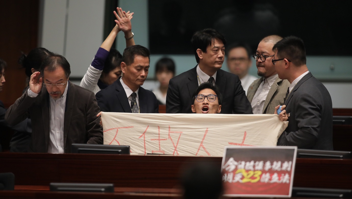 Localist lawmaker Chu Hoi-dick was ordered out of the chamber following a protest last week over changes to Legco's Rules of Procedure. Photo: HKEJ Localist lawmaker Chu Hoi-dick was ordered out of the chamber following a protest last week over changes to Legco's Rules of Procedure. Photo: HKEJ