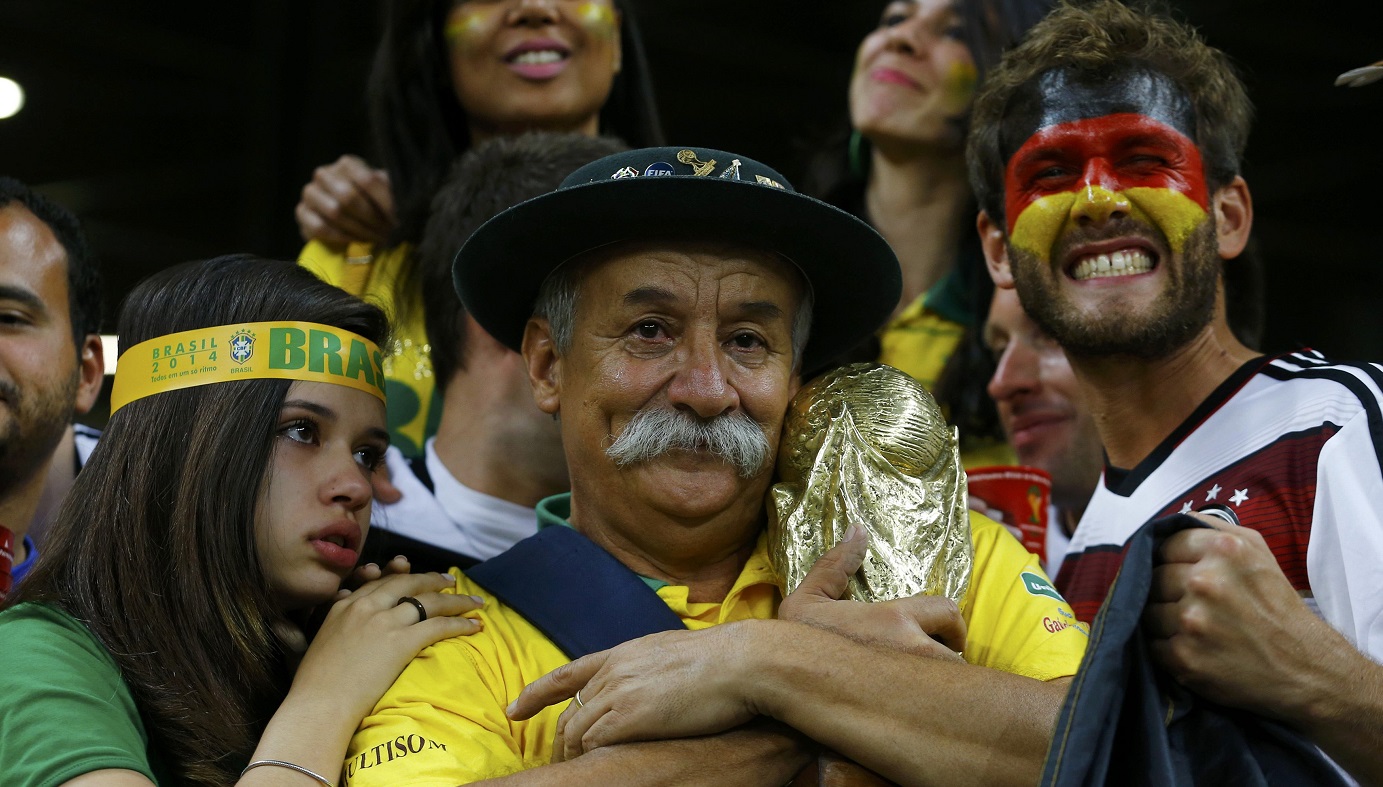 Brazil fans celebrate after the team's 2014 World Cup semi-finals victory against Germany. The World Cup is a cash-cow for FIFA, which is under pressure to generate more consistent revenue flows. Photo: Reuters Brazil fans celebrate after the team's 2014 World Cup semi-finals victory against Germany. The World Cup is a cash-cow for FIFA, which is under pressure to generate more consistent revenue flows. Photo: Reuters