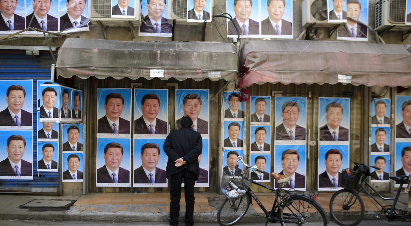 A building is covered with posters of Chinese President Xi Jinping in Shanghai. China is "going to extraordinary lengths to impose its views on the rest of the world". Photo: Reuters A building is covered with posters of Chinese President Xi Jinping in Shanghai. China is "going to extraordinary lengths to impose its views on the rest of the world". Photo: Reuters