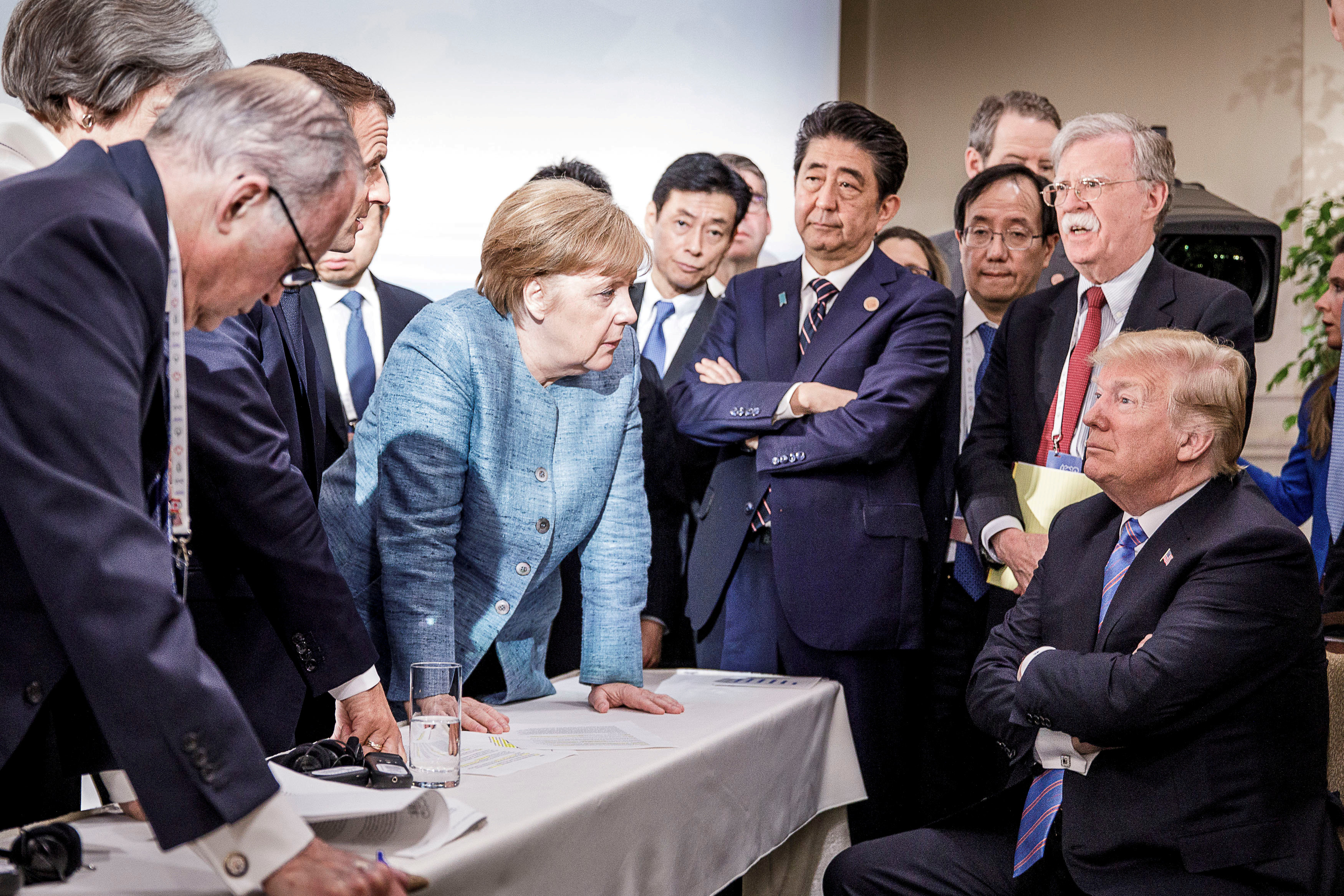 German Chancellor Angela Merkel speaks to US President Donald Trump during the second day of the G7 meeting in Quebec, Canada, on June 9. Photo: Handout via Reuters German Chancellor Angela Merkel speaks to US President Donald Trump during the second day of the G7 meeting in Quebec, Canada, on June 9. Photo: Handout via Reuters