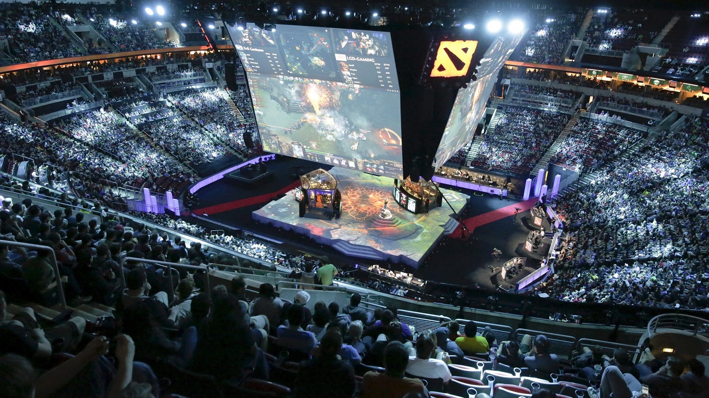 People watch a gaming competition at a venue in Seattle, US. E-sports are gaining in popularity, drawing lot of publicity and commercial sponsorship. Photo: Reuters People watch a gaming competition at a venue in Seattle, US. E-sports are gaining in popularity, drawing lot of publicity and commercial sponsorship. Photo: Reuters