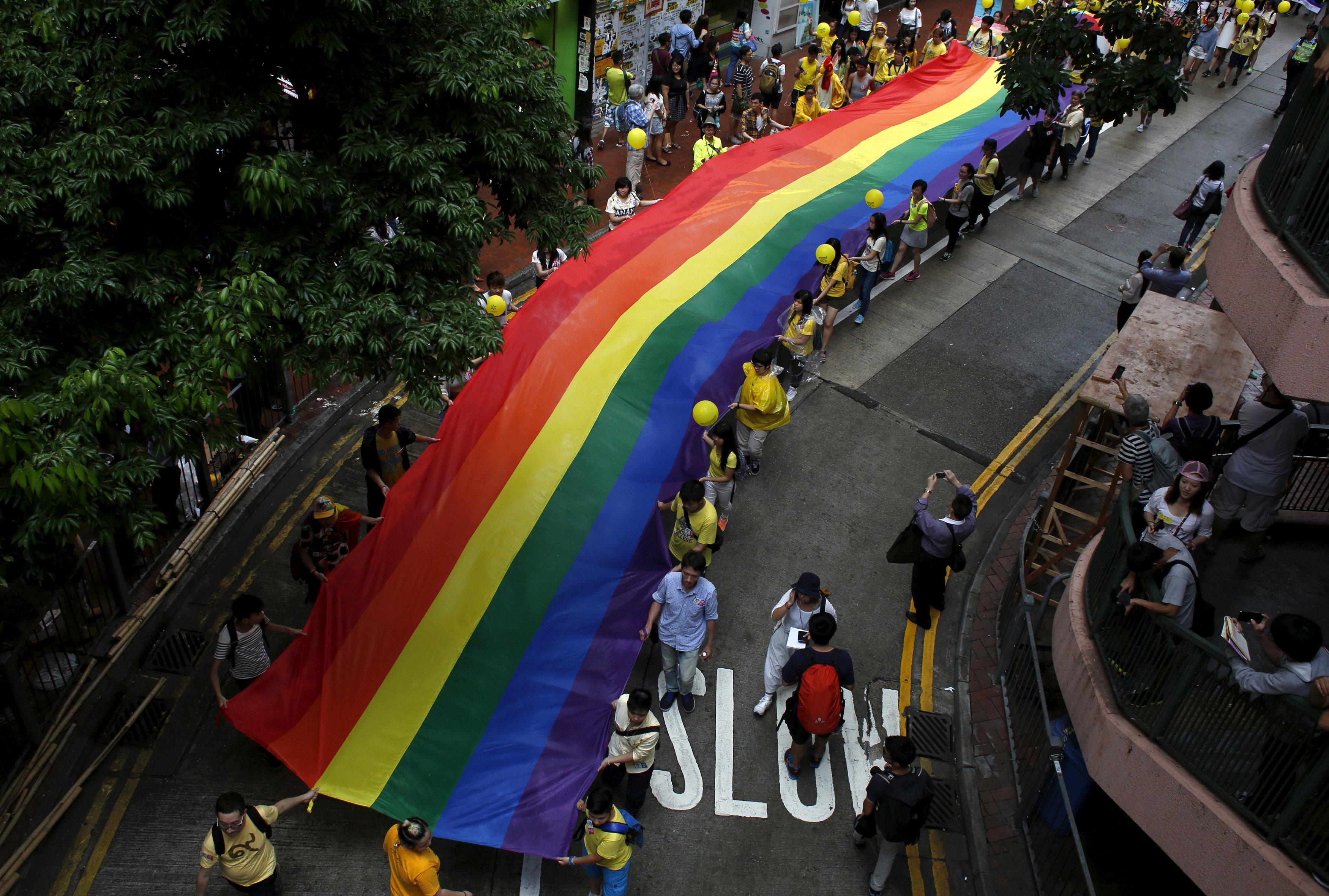 A file picture shows people marching with a banner with rainbow colors during the annual pride parade in Hong Kong in support of LGBT rights. Credit: Reuters A file picture shows people marching with a banner with rainbow colors during the annual pride parade in Hong Kong in support of LGBT rights. Credit: Reuters