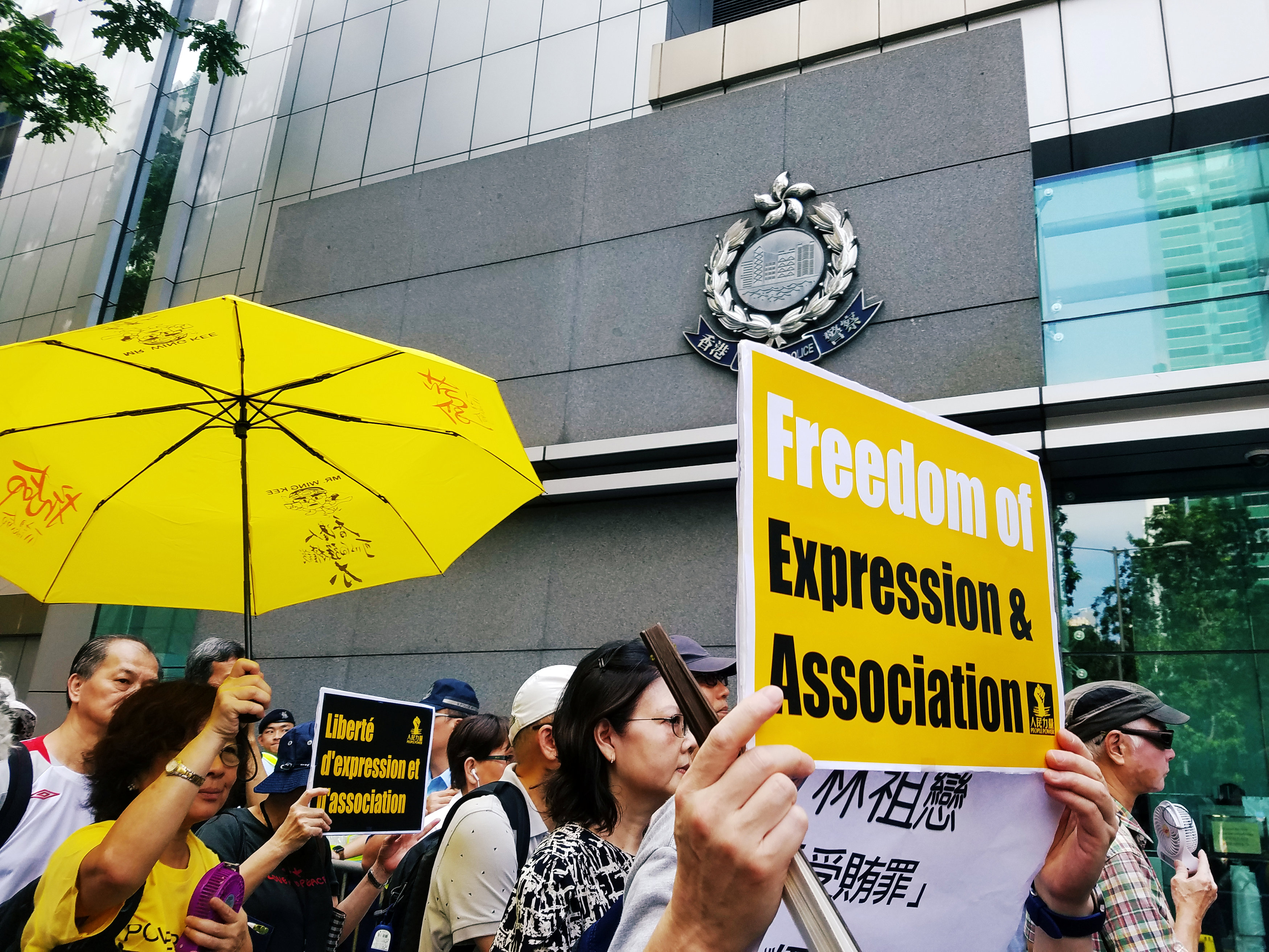 Protesters call for protection of freedom of expression and association during a rally outside the Hong Kong Police headquarters on July 21. Photo: Reuters Protesters call for protection of freedom of expression and association during a rally outside the Hong Kong Police headquarters on July 21. Photo: Reuters