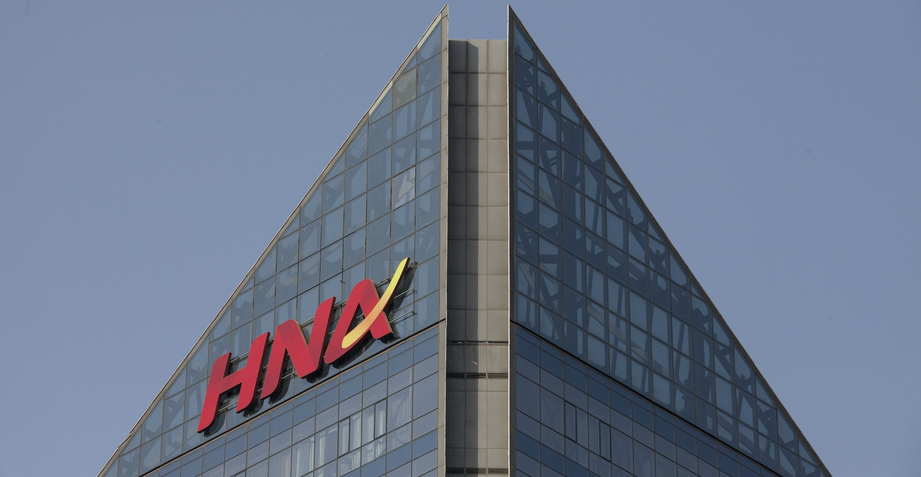 HNA is under pressure to cut its huge debt and restructure after a US$50 billion acquisition spree in recent years. Photo: Bloomberg HNA is under pressure to cut its huge debt and restructure after a US$50 billion acquisition spree in recent years. Photo: Bloomberg