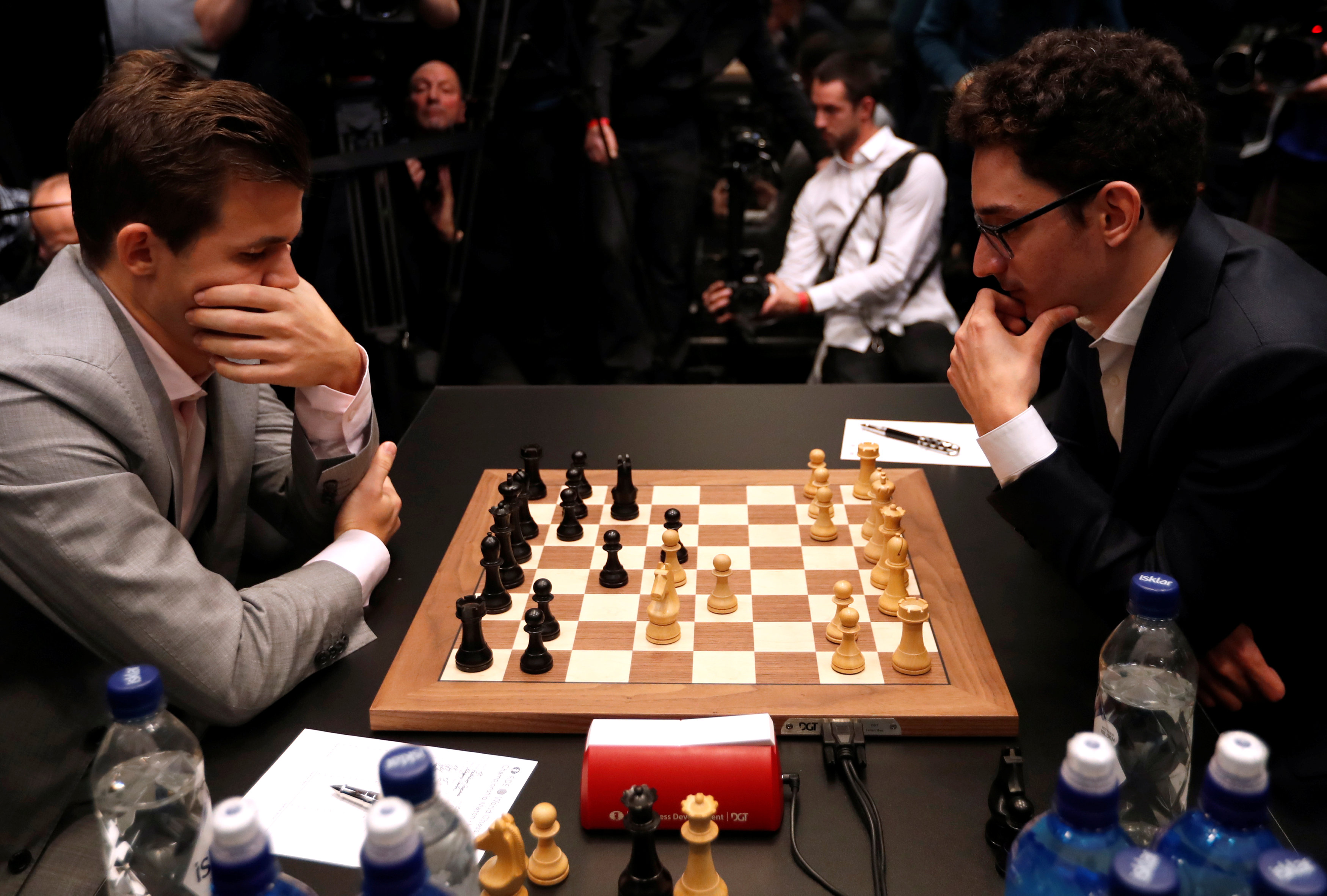 Norway's Magnus Carlsen (left) and the United States' Fabiano Caruana plot their moves at the World Chess Championship Final in London. Photo: Reuters Norway's Magnus Carlsen (left) and the United States' Fabiano Caruana plot their moves at the World Chess Championship Final in London. Photo: Reuters