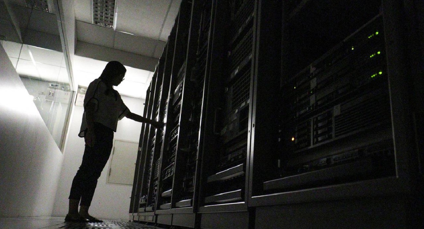 An employee works inside a server room at a company. Businesses should guard against cyber-security threats from outside and should also watch out for potential risks from within the organization, an expert says. Photo: Reuters An employee works inside a server room at a company. Businesses should guard against cyber-security threats from outside and should also watch out for potential risks from within the organization, an expert says. Photo: Reuters