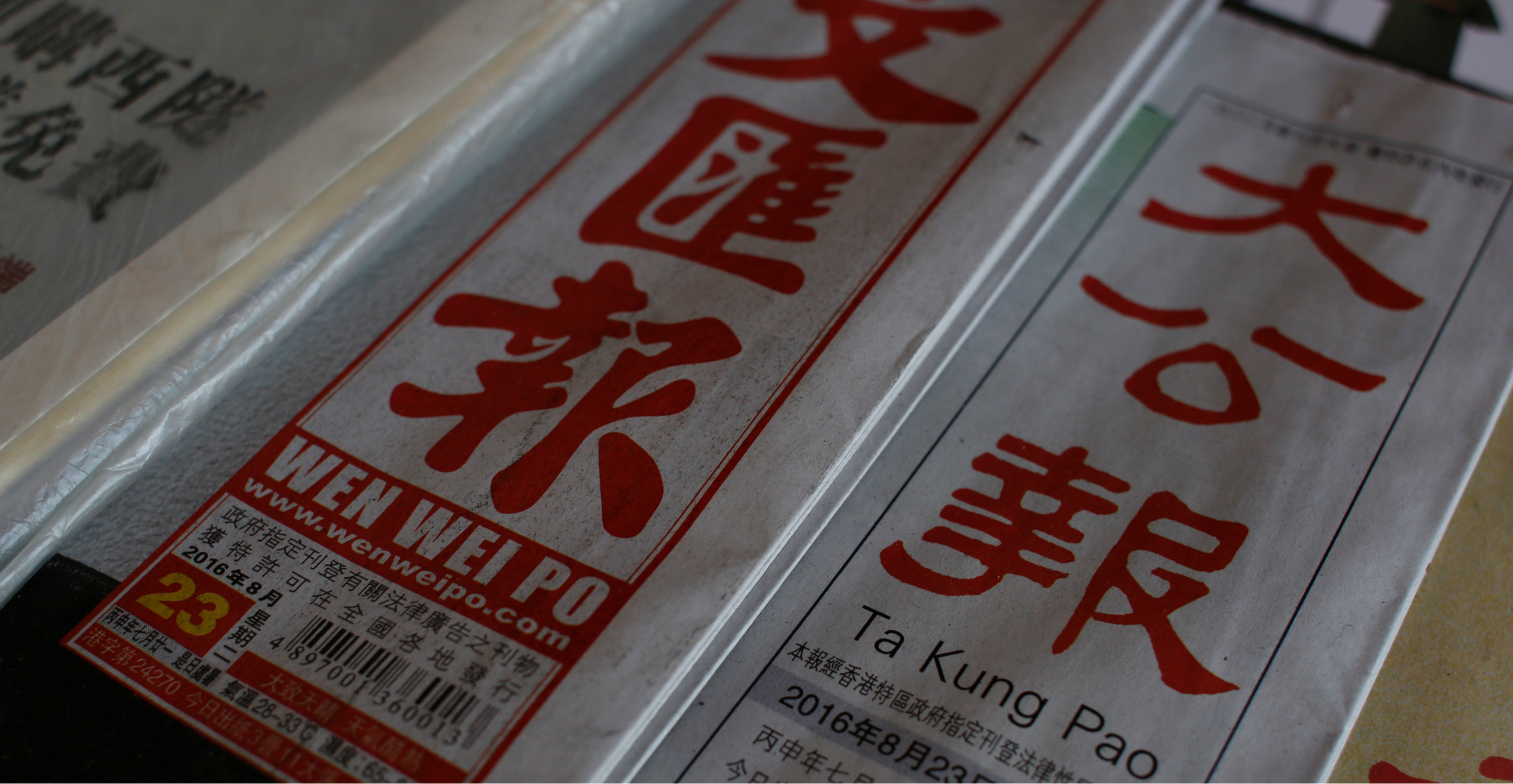 Pro-Beijing newspapers Wen Wei Po and Ta Kung Pao have reported on the activities of pro-democracy personalities in Hong Kong and Taiwan. Photo: Reuters Pro-Beijing newspapers Wen Wei Po and Ta Kung Pao have reported on the activities of pro-democracy personalities in Hong Kong and Taiwan. Photo: Reuters