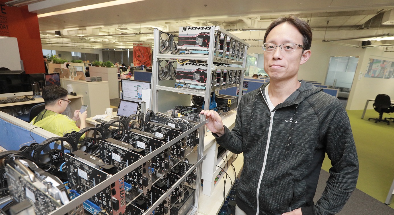 Yat Siu has put up a cryptocurrency mining rig for demonstration in his office. The tech veteran bets big on blockchain and cryptocurrency technology. Photo: HKEJ Yat Siu has put up a cryptocurrency mining rig for demonstration in his office. The tech veteran bets big on blockchain and cryptocurrency technology. Photo: HKEJ