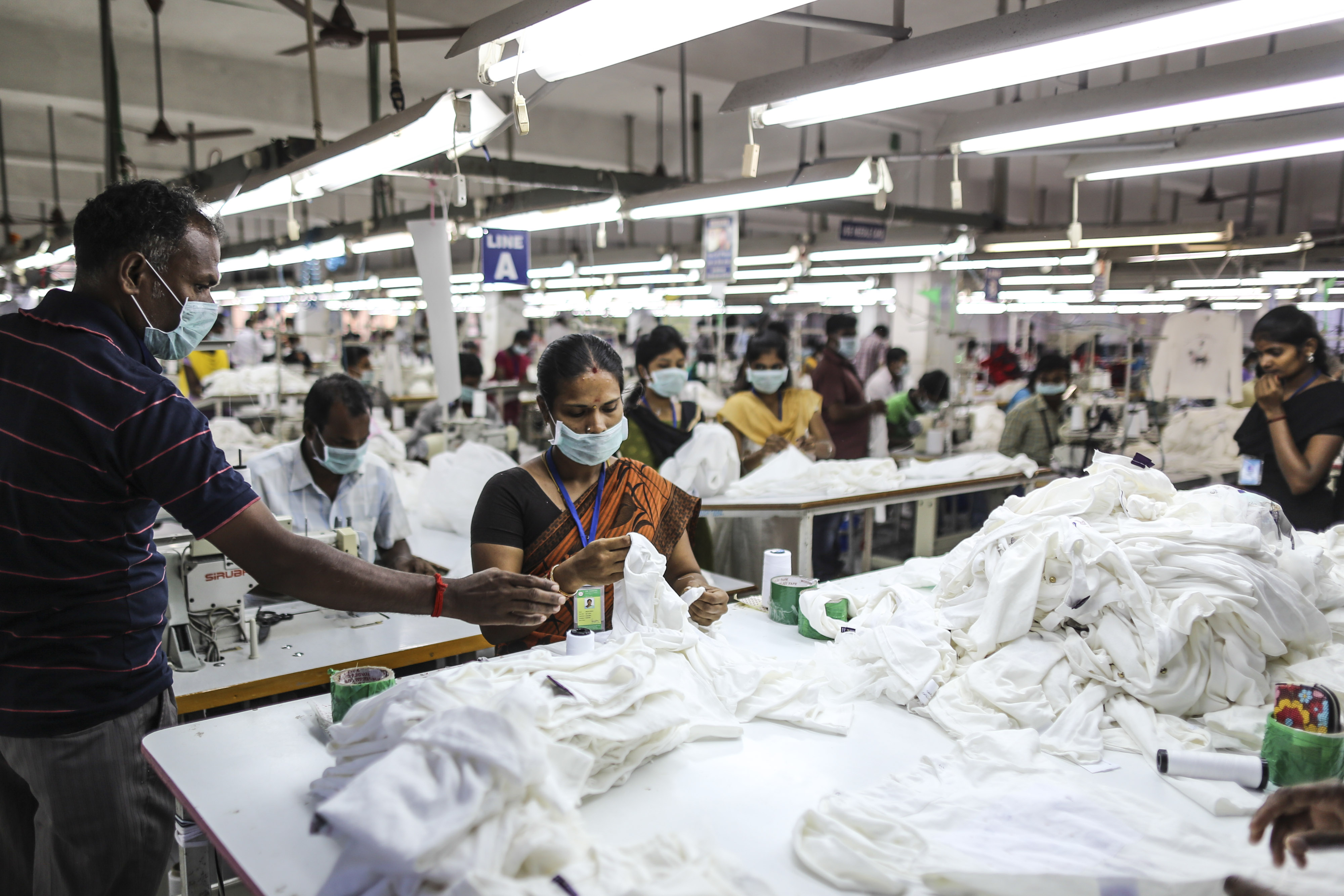 A garment factory in Tiruppur, India. China's move up the value chain meant the relocation of low-end manufacturing into other Asian countries like Bangladesh, India and Vietnam. Photo: Bloomberg A garment factory in Tiruppur, India. China's move up the value chain meant the relocation of low-end manufacturing into other Asian countries like Bangladesh, India and Vietnam. Photo: Bloomberg