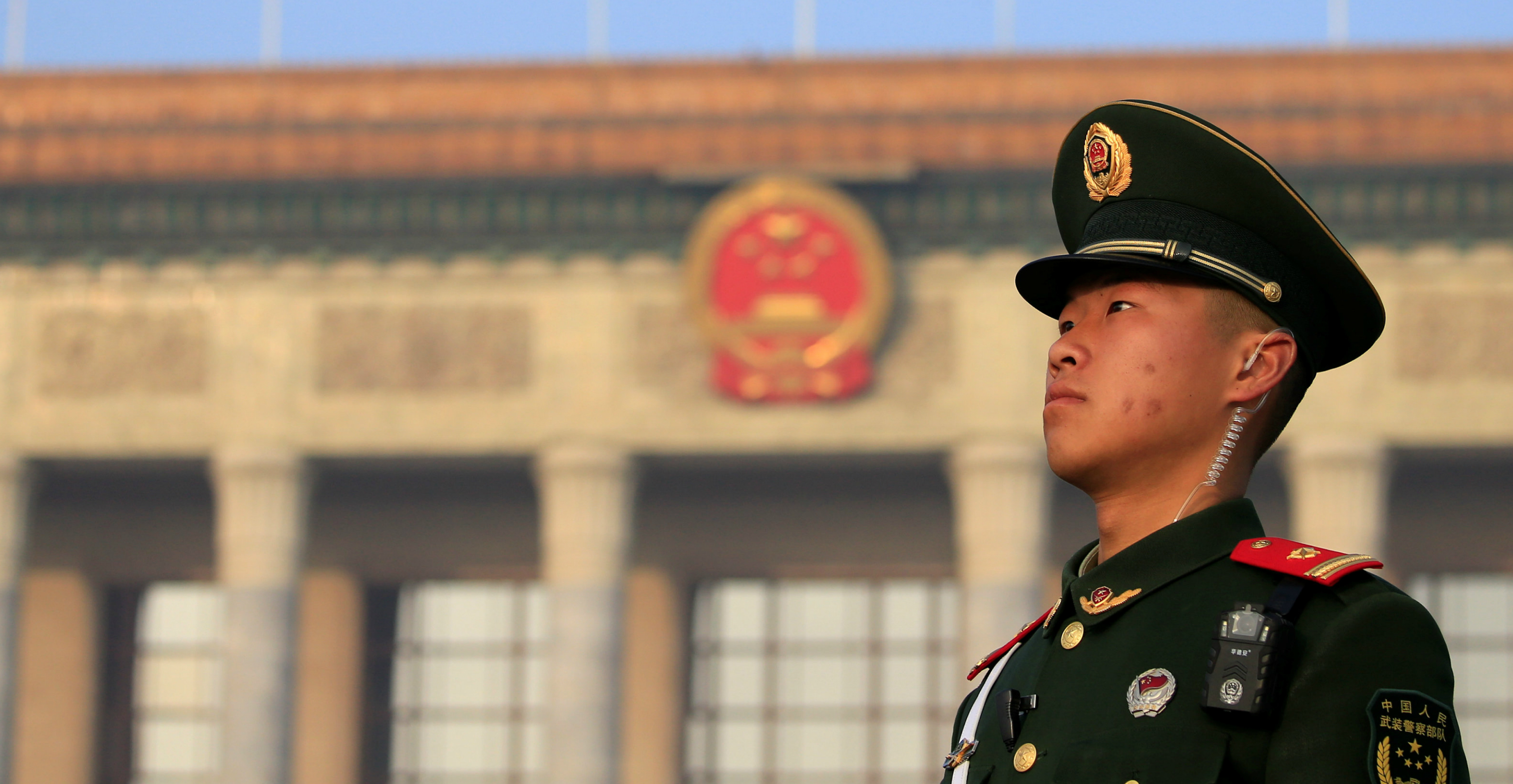 A military police officer stands guard outside the Great Hall of the People in Beijing. China should step up efforts to build a new type of relationship between the government and the business sector. Photo: Reuters A military police officer stands guard outside the Great Hall of the People in Beijing. China should step up efforts to build a new type of relationship between the government and the business sector. Photo: Reuters
