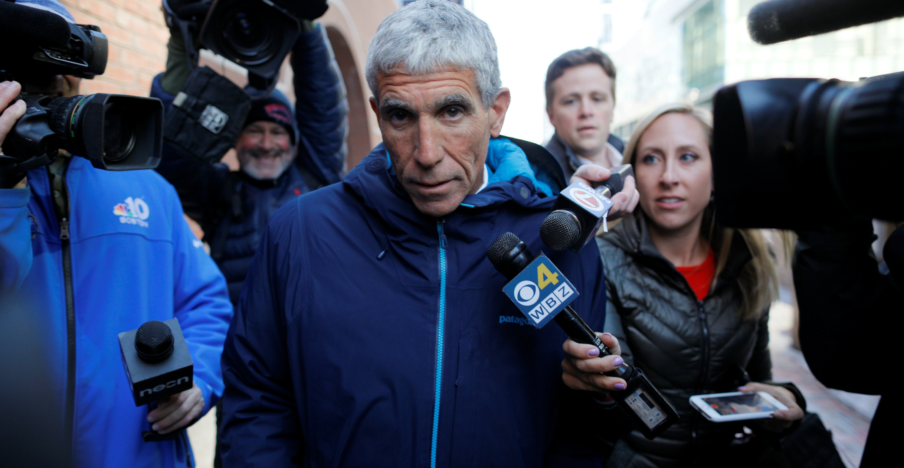 William "Rick" Singer leaves the federal courthouse after facing charges in a nationwide college admissions cheating scheme in Boston, Massachusetts, on Tuesday. Photo: Reuters William "Rick" Singer leaves the federal courthouse after facing charges in a nationwide college admissions cheating scheme in Boston, Massachusetts, on Tuesday. Photo: Reuters