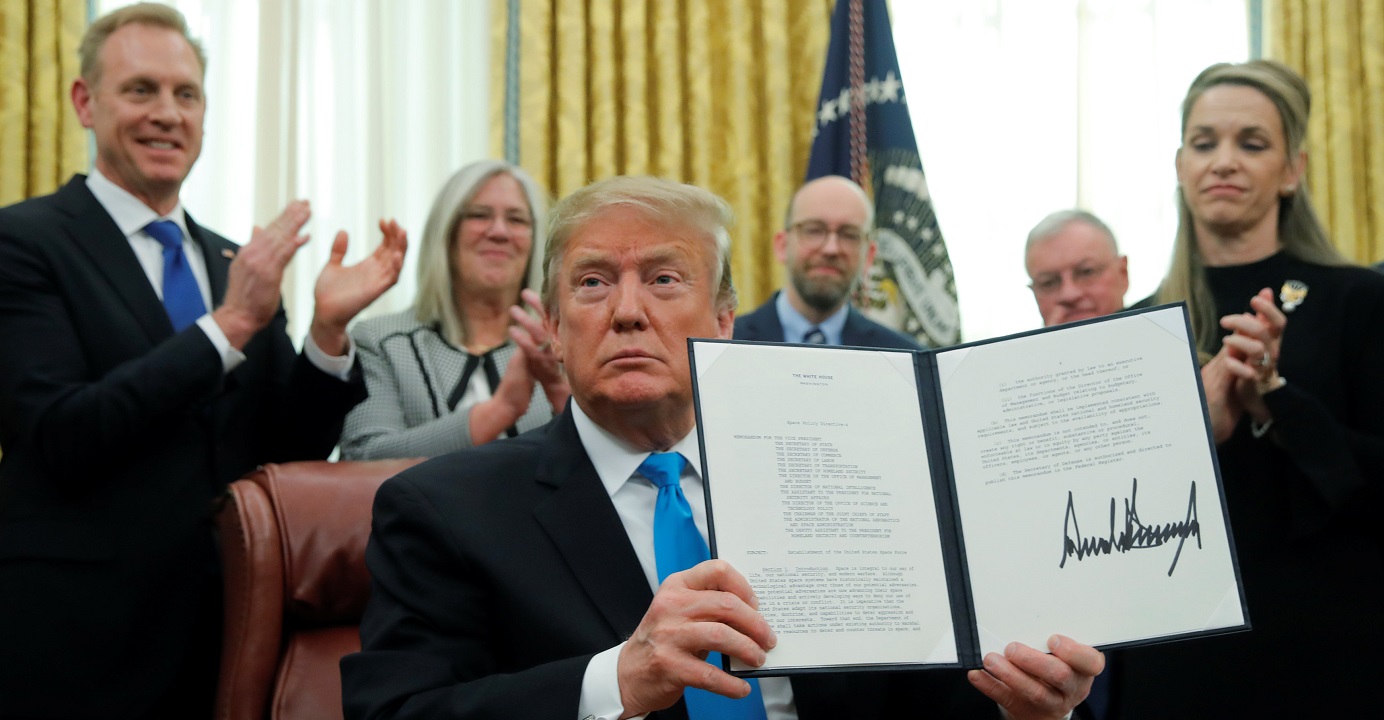 Donald Trump displays the "Space Policy Directive 4" after signing an order on Feb. 19 to establish a Space Force as the sixth branch of the US Armed Forces. Photo: Reuters Donald Trump displays the "Space Policy Directive 4" after signing an order on Feb. 19 to establish a Space Force as the sixth branch of the US Armed Forces. Photo: Reuters