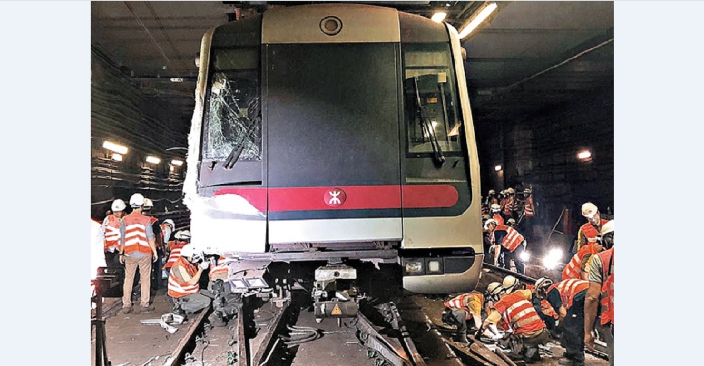 MTR and Fire Services Department personnel work to restore services on the Tsuen Wan Line following Monday's train collision and derailment. Photo: MTR Corp. MTR and Fire Services Department personnel work to restore services on the Tsuen Wan Line following Monday's train collision and derailment. Photo: MTR Corp.